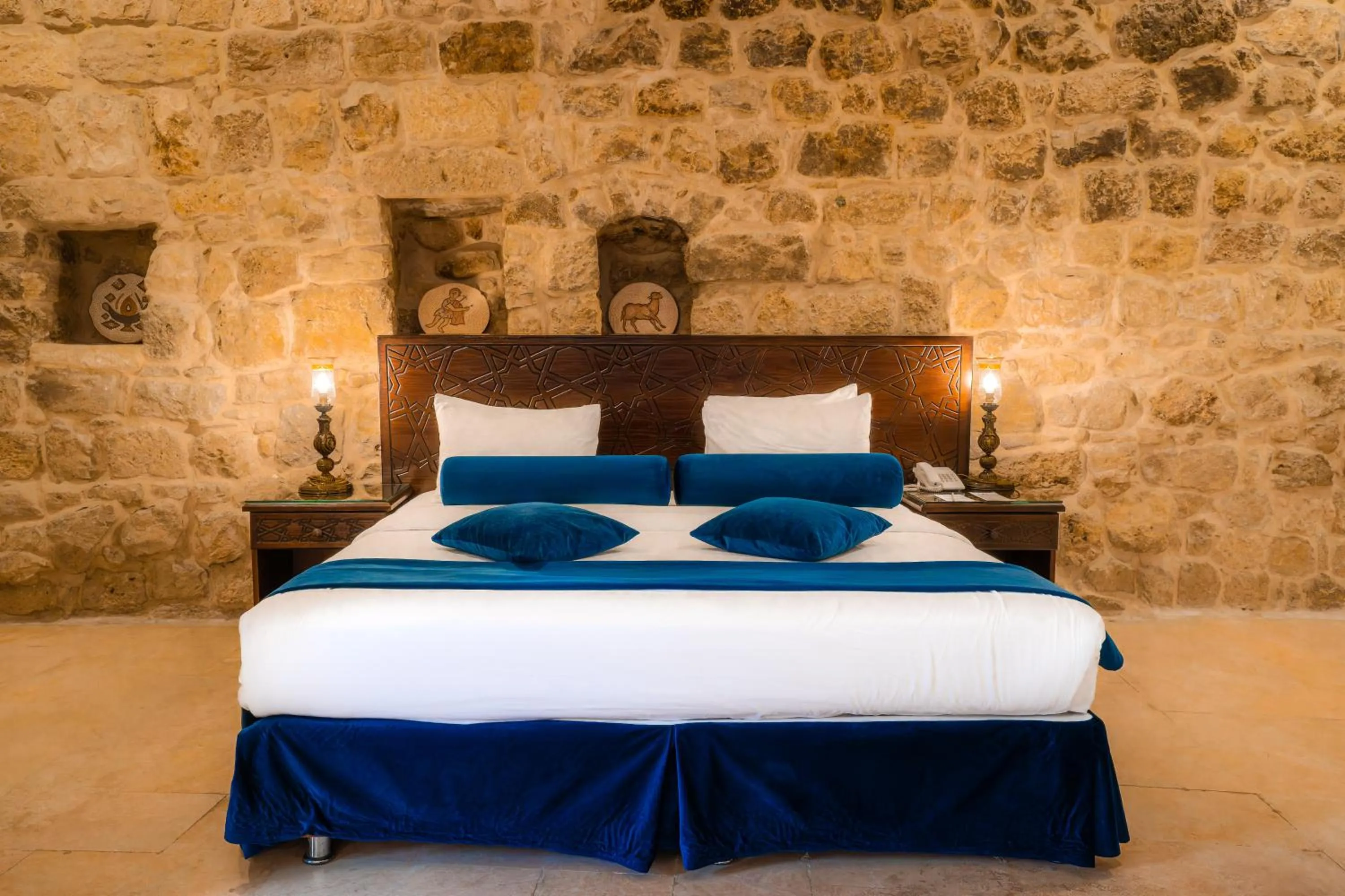 Bed in The Old Village Hotel & Resort