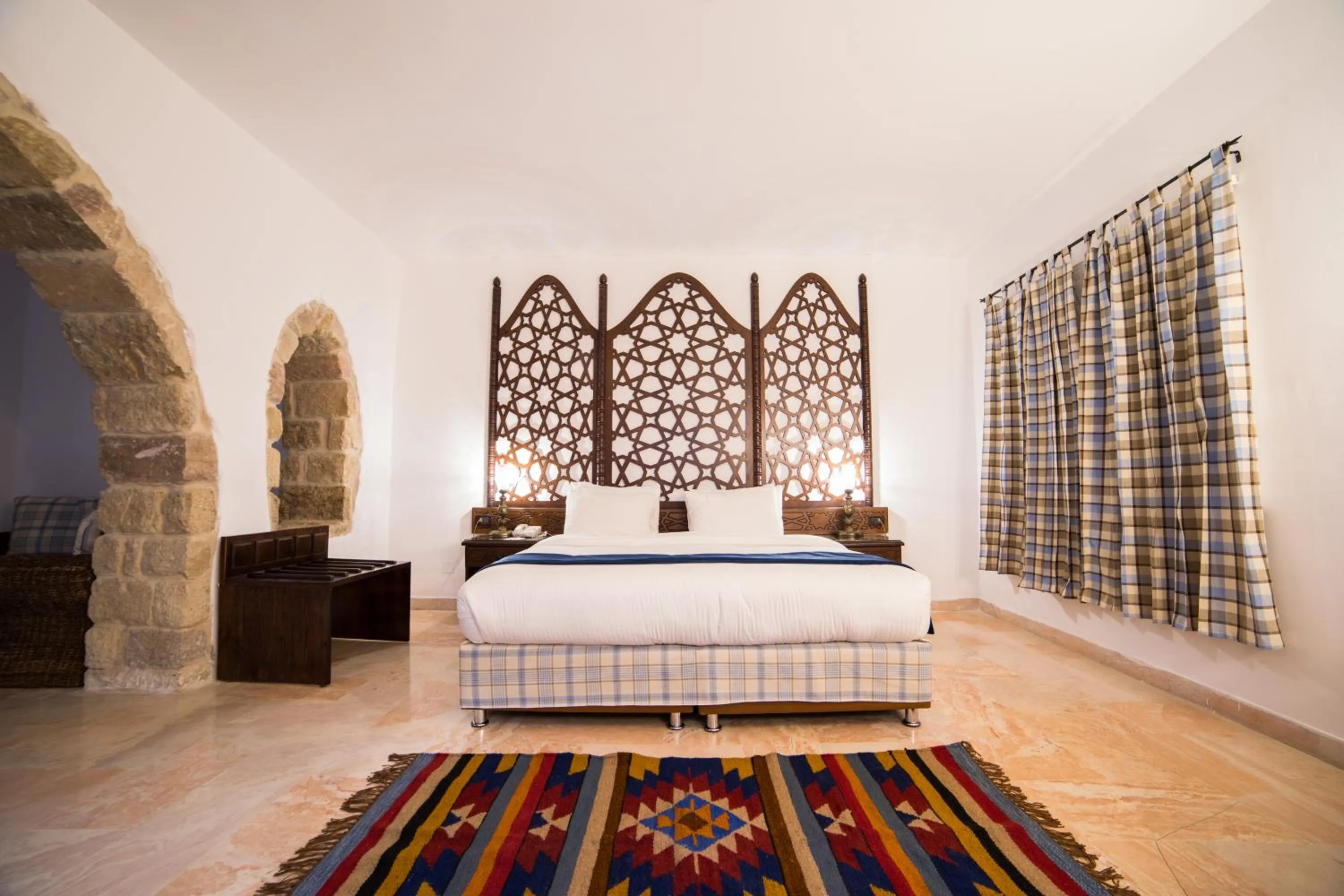 Bed in The Old Village Hotel & Resort