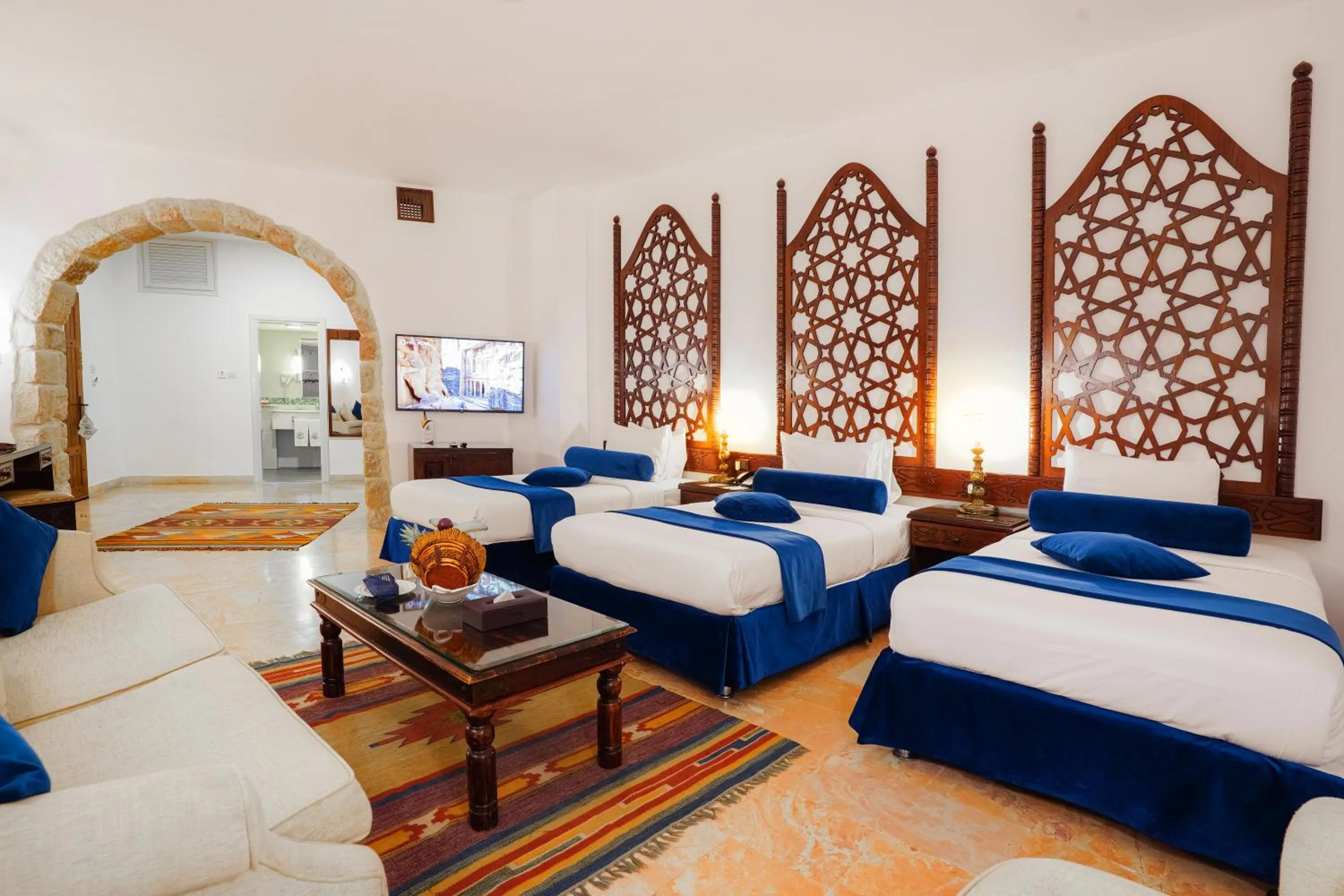 Bed in The Old Village Hotel & Resort