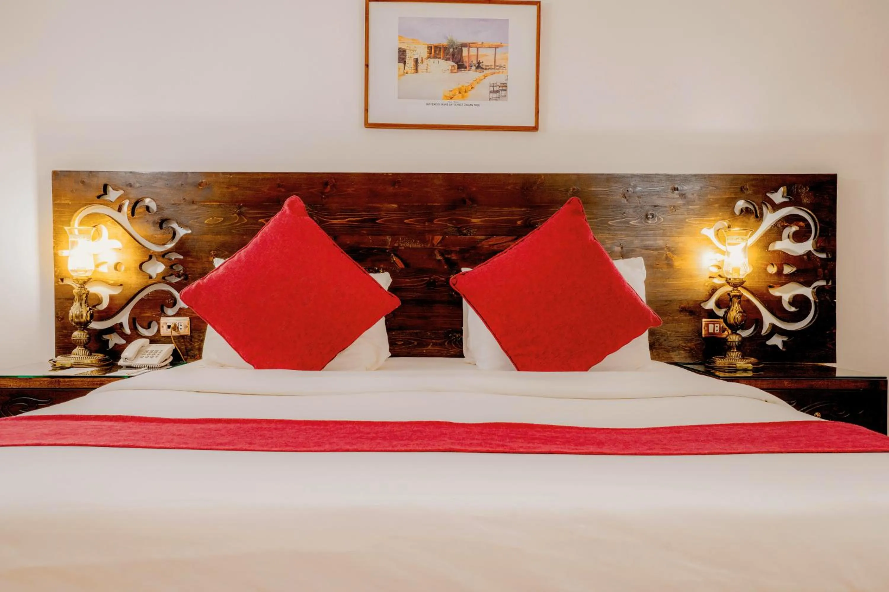 Bed in The Old Village Hotel & Resort