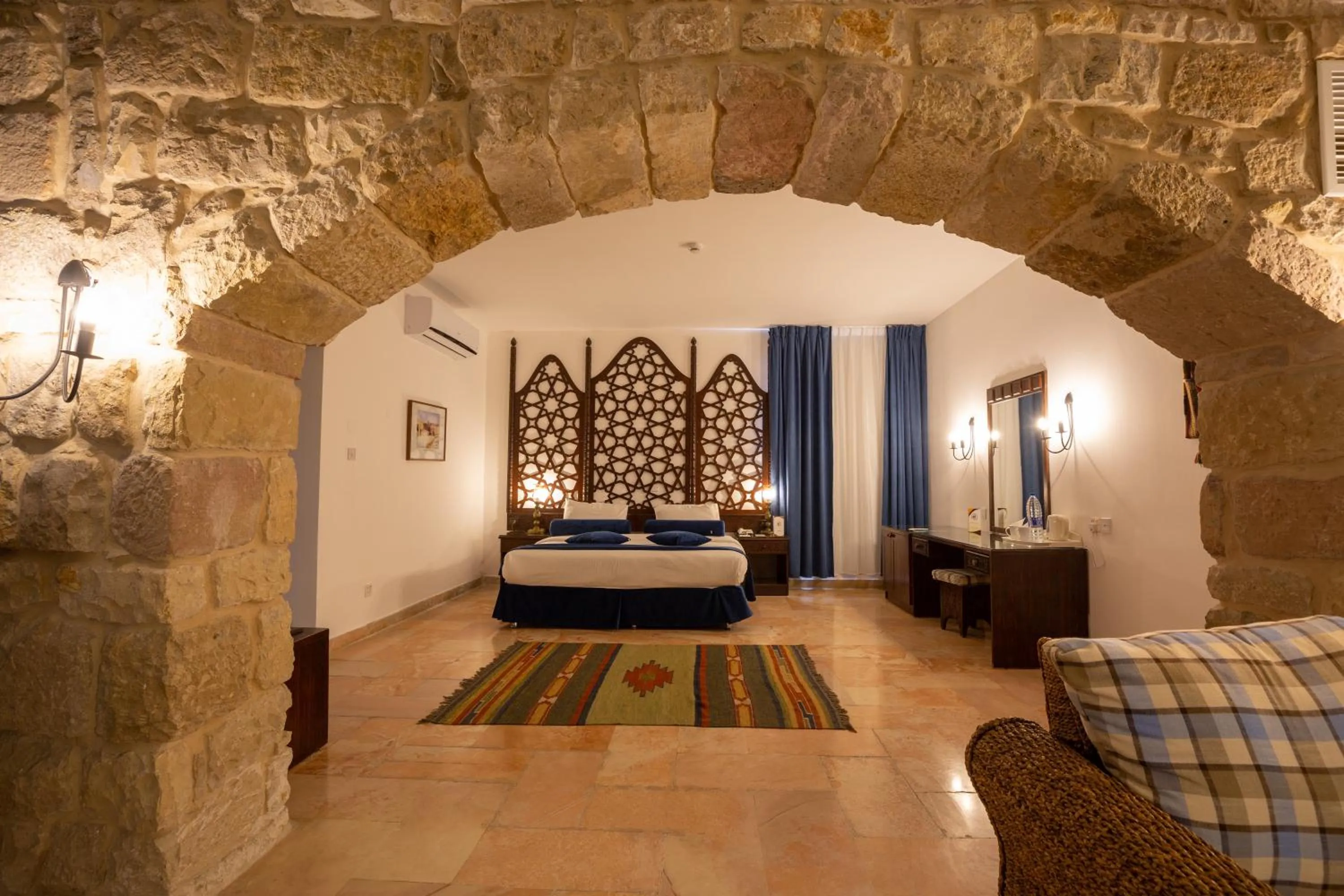 Bed in The Old Village Hotel & Resort