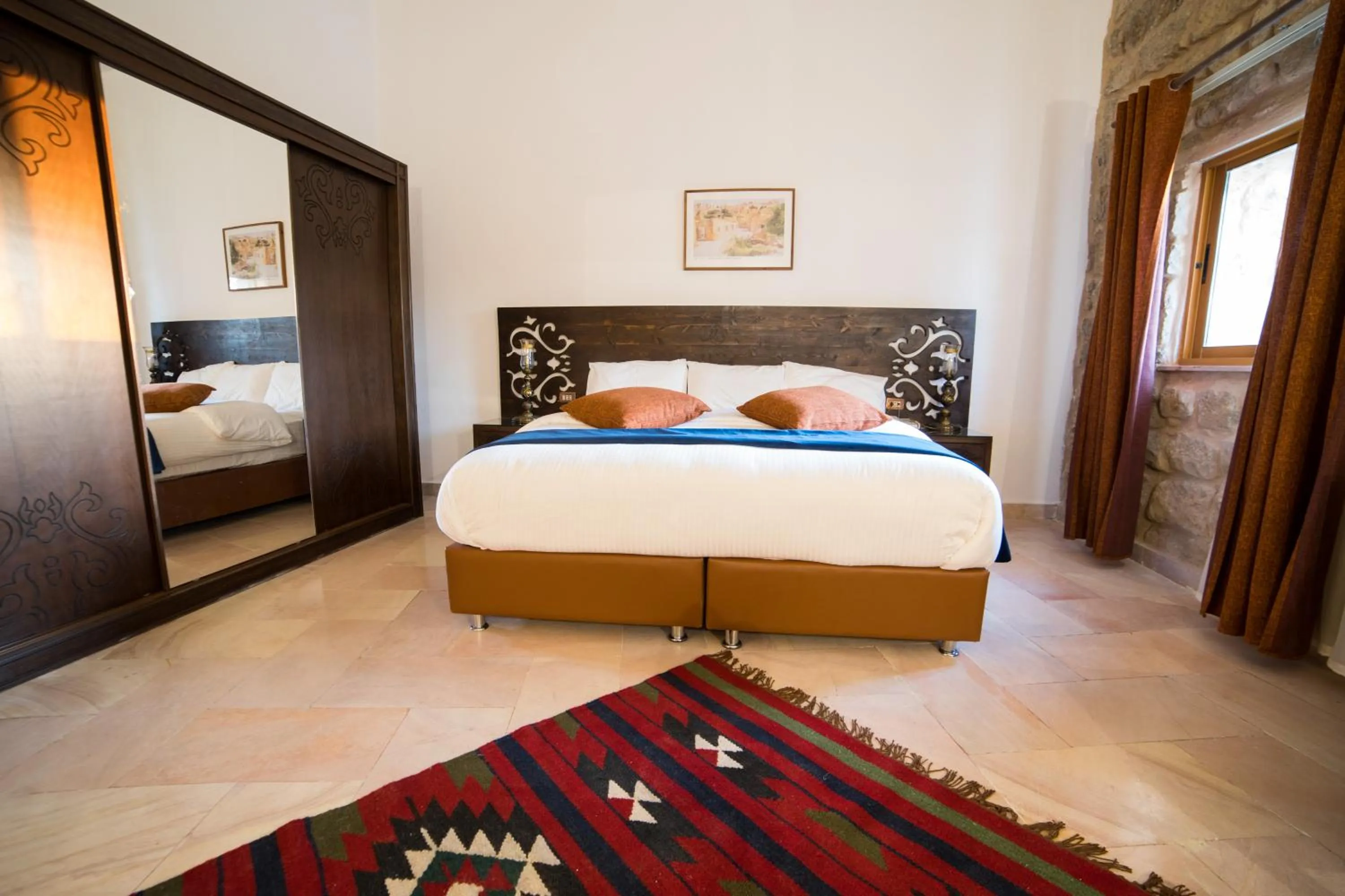 Bed in The Old Village Hotel & Resort