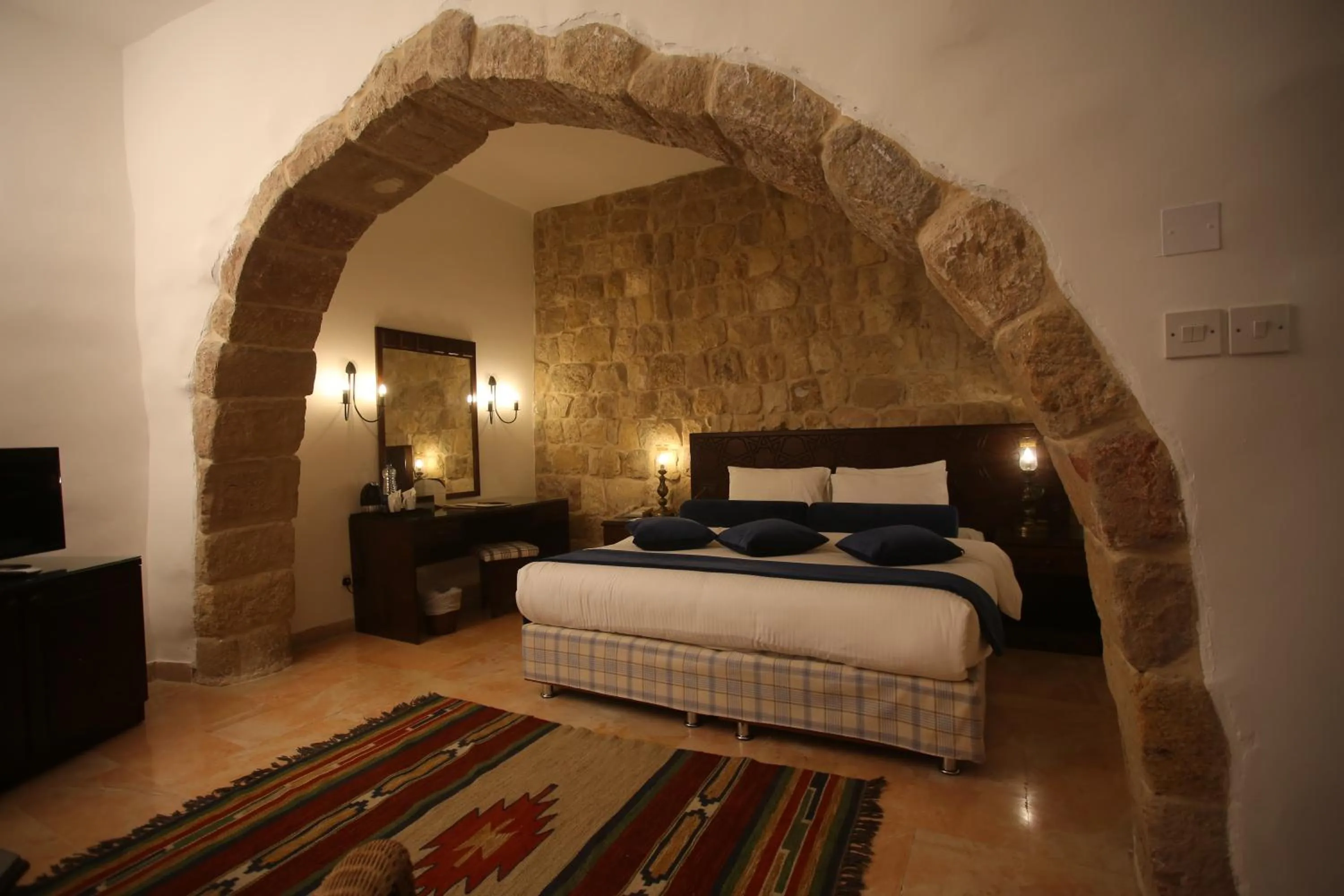 Bed in The Old Village Hotel & Resort