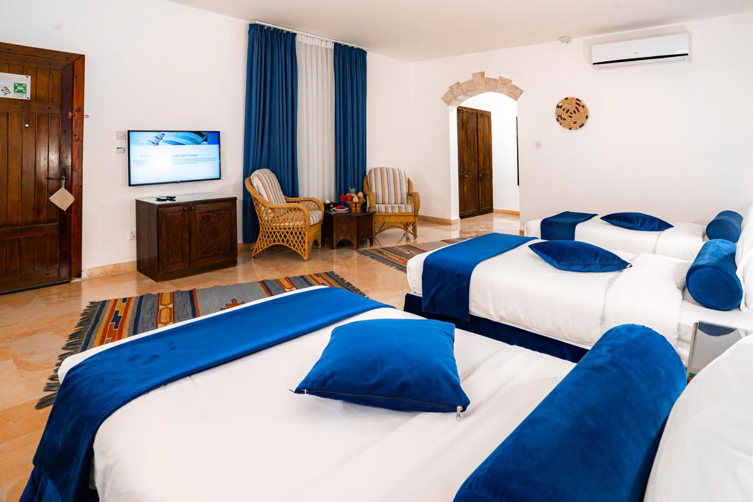 Bed in The Old Village Hotel & Resort