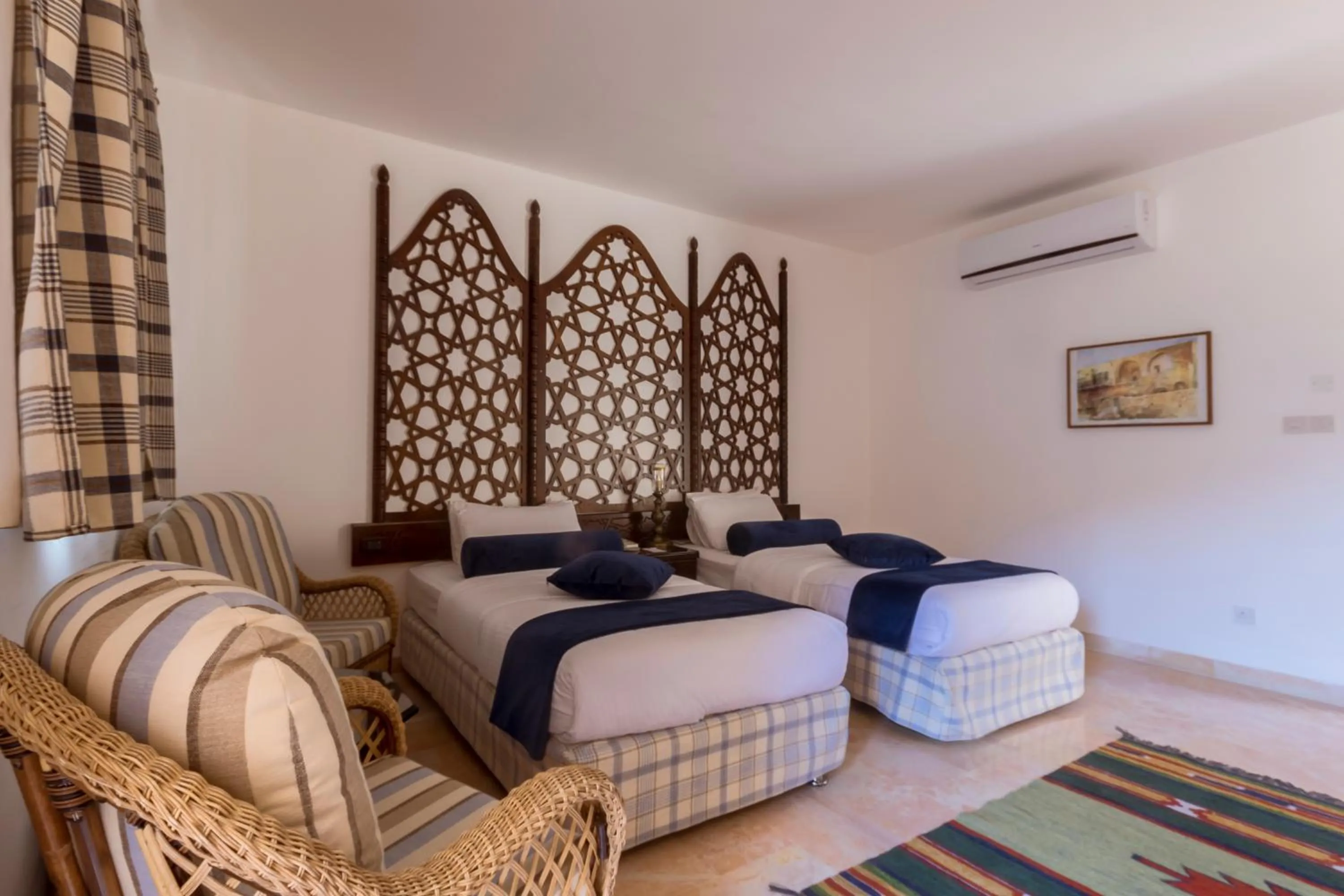 Bed in The Old Village Hotel & Resort