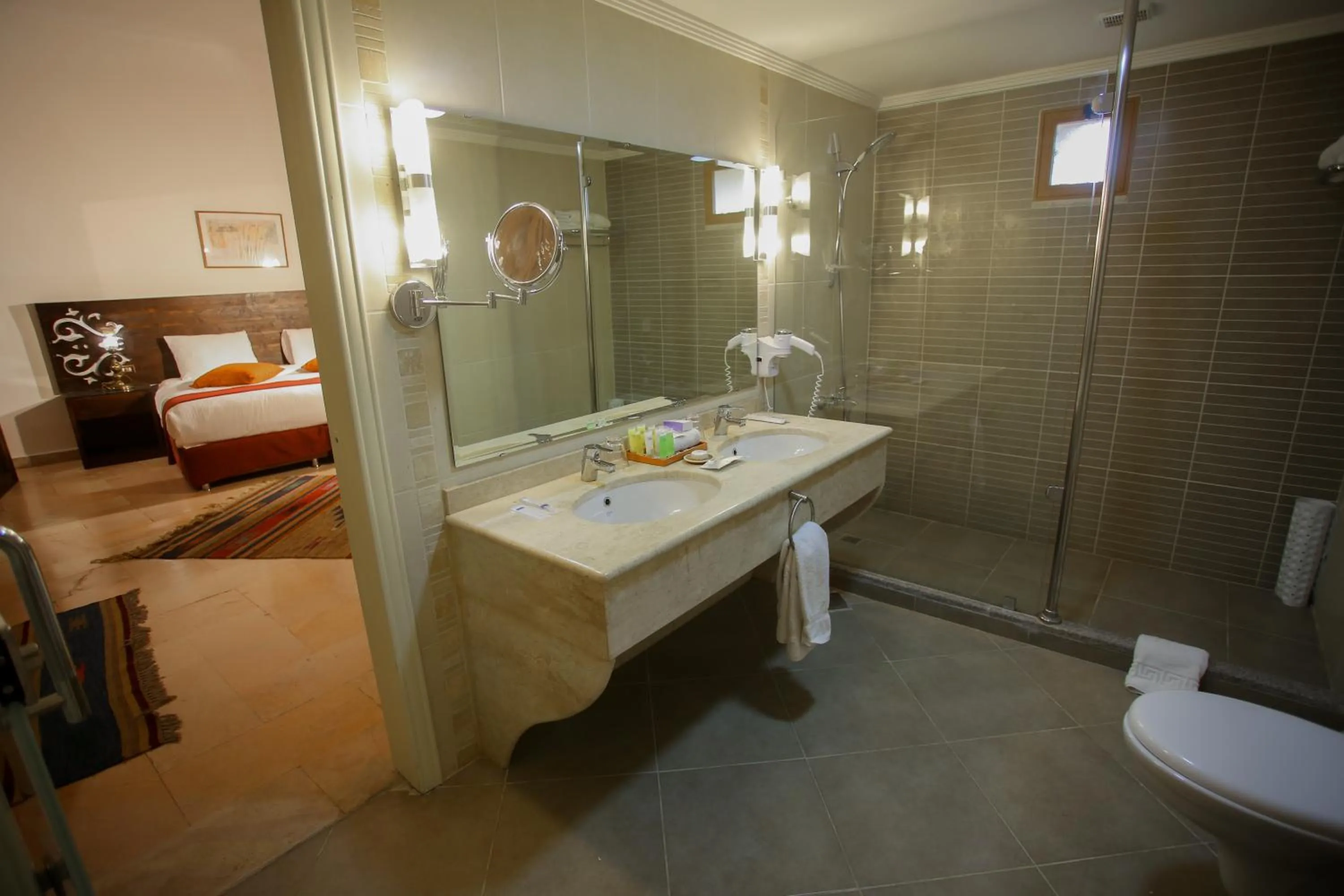 Bed in The Old Village Hotel & Resort