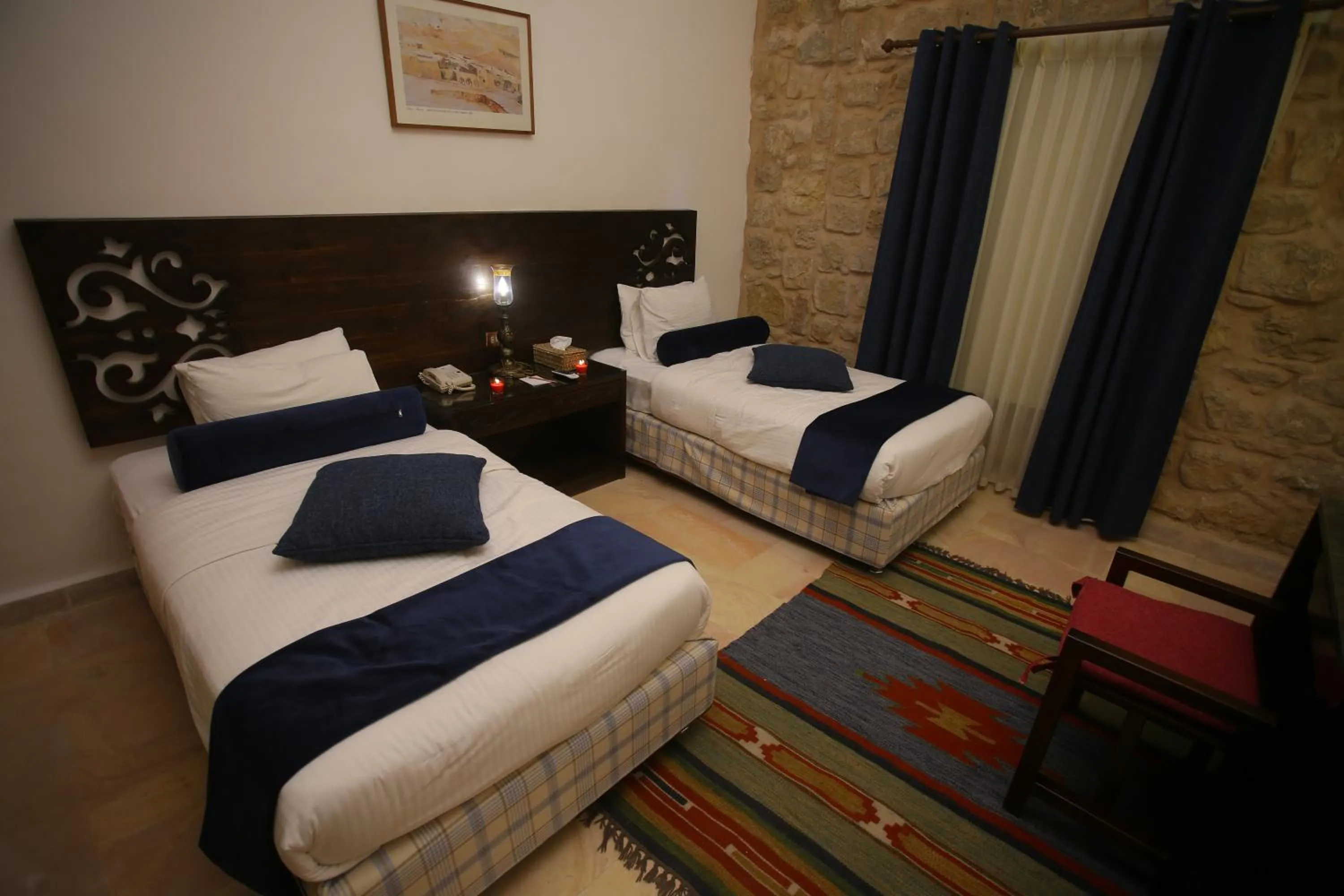 Bed in The Old Village Hotel & Resort