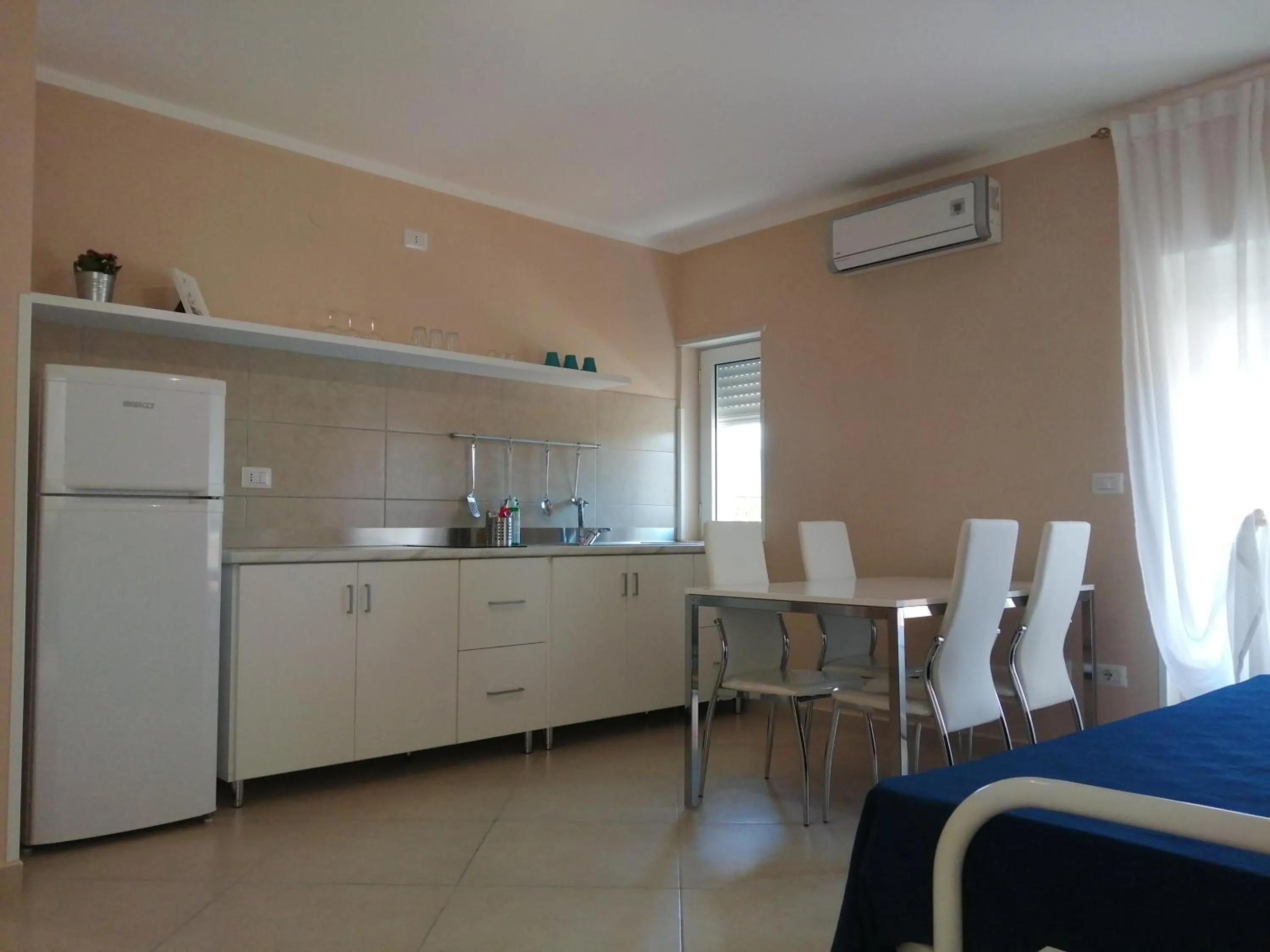 Kitchen or kitchenette in Villa Laura Residence Hotel Apartments & Studios