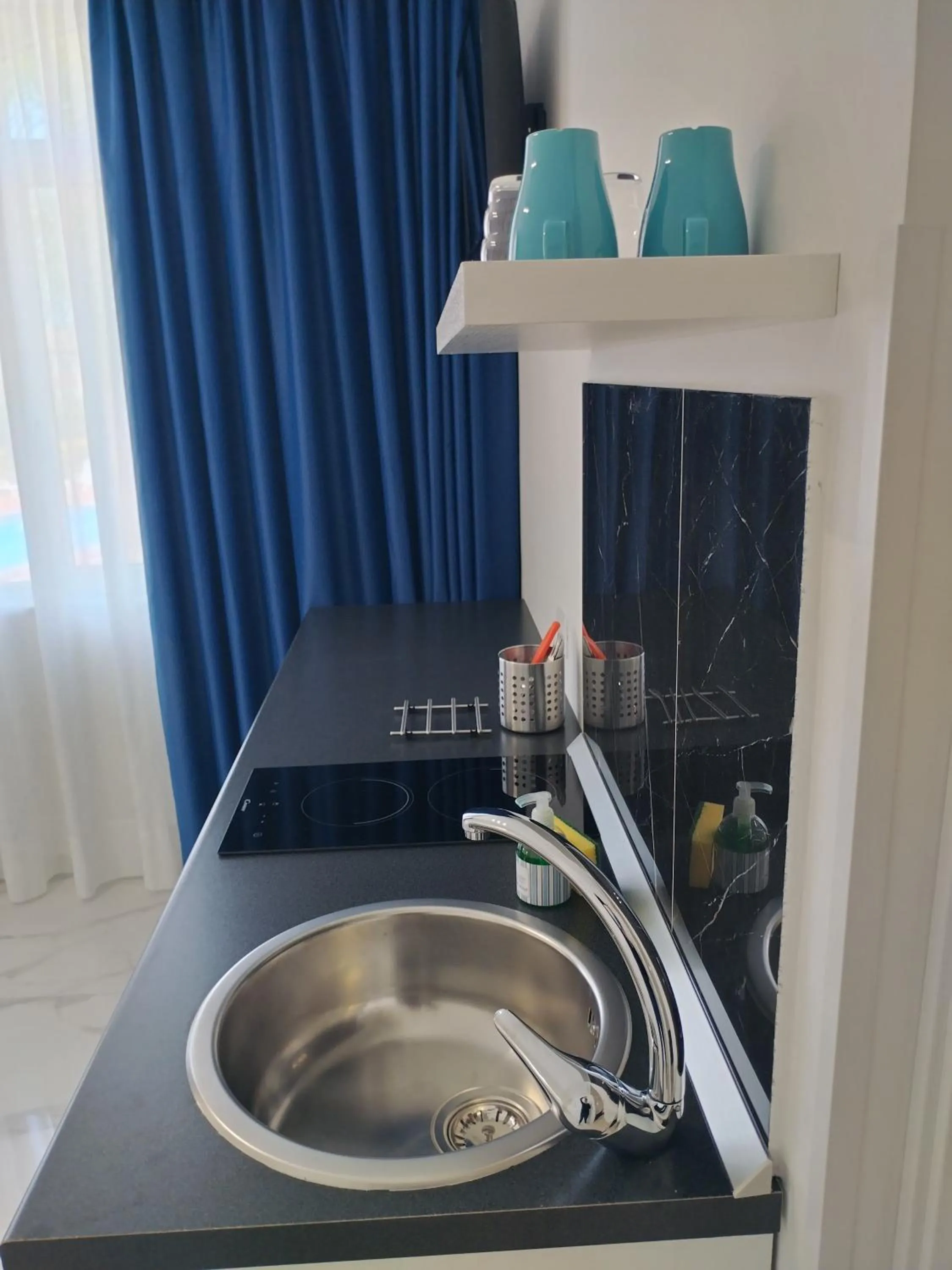 Kitchen or kitchenette in Villa Laura Residence Hotel Apartments & Studios