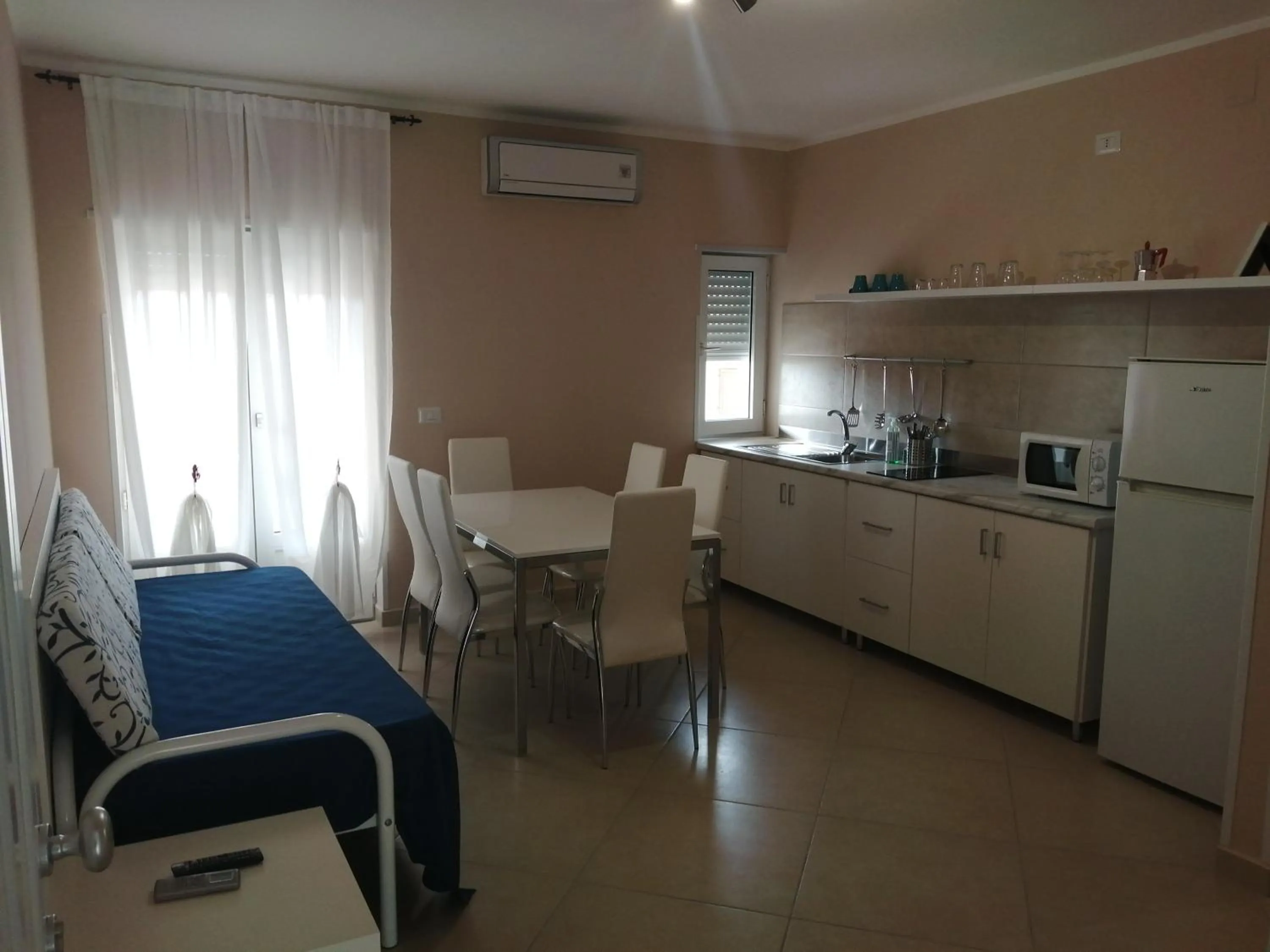 Kitchen or kitchenette in Villa Laura Residence Hotel Apartments & Studios