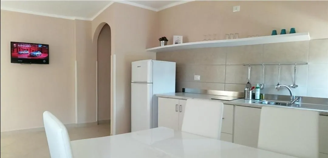 Kitchen or kitchenette in Villa Laura Residence Hotel Apartments & Studios