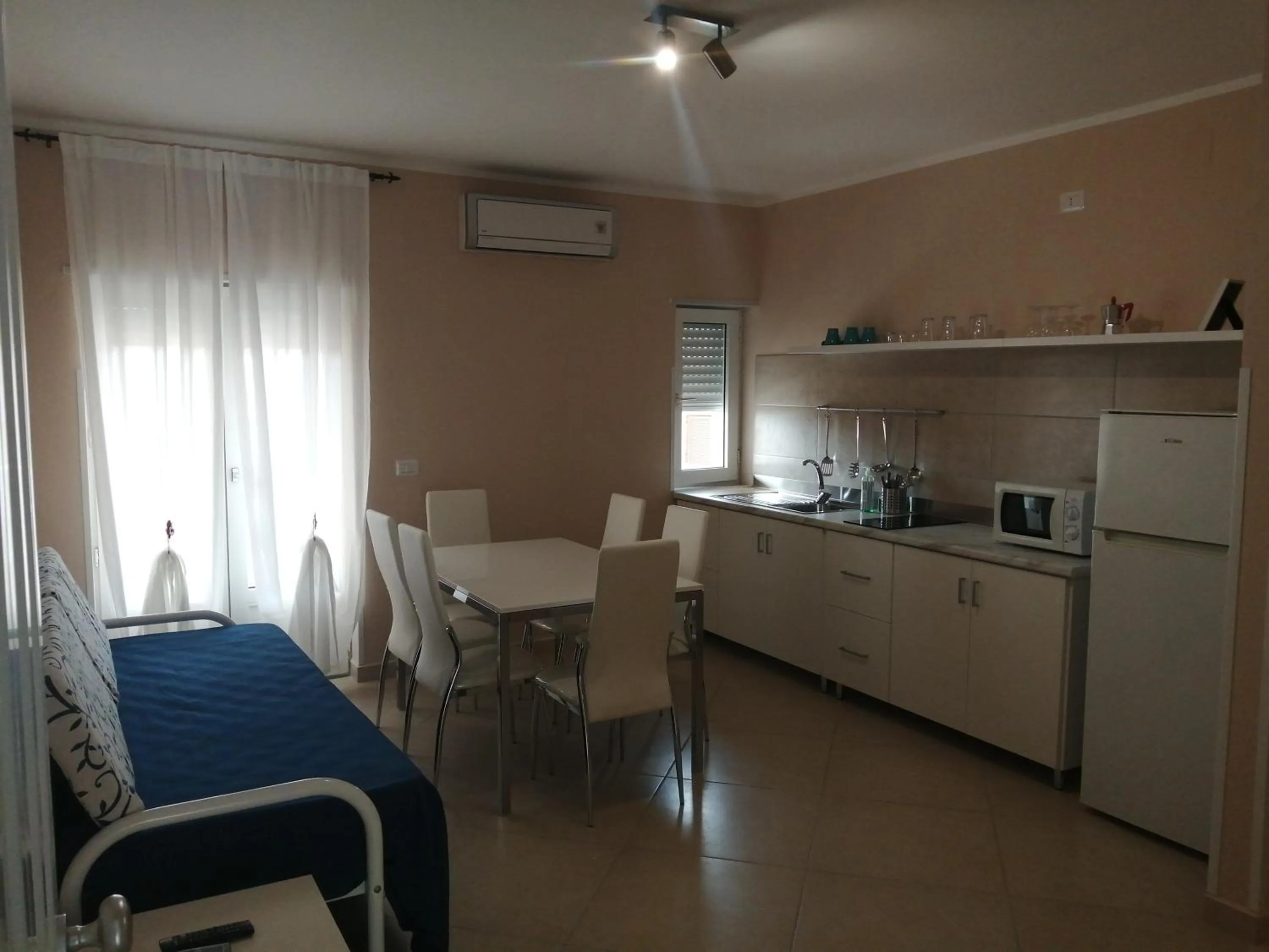 Kitchen or kitchenette in Villa Laura Residence Hotel Apartments & Studios