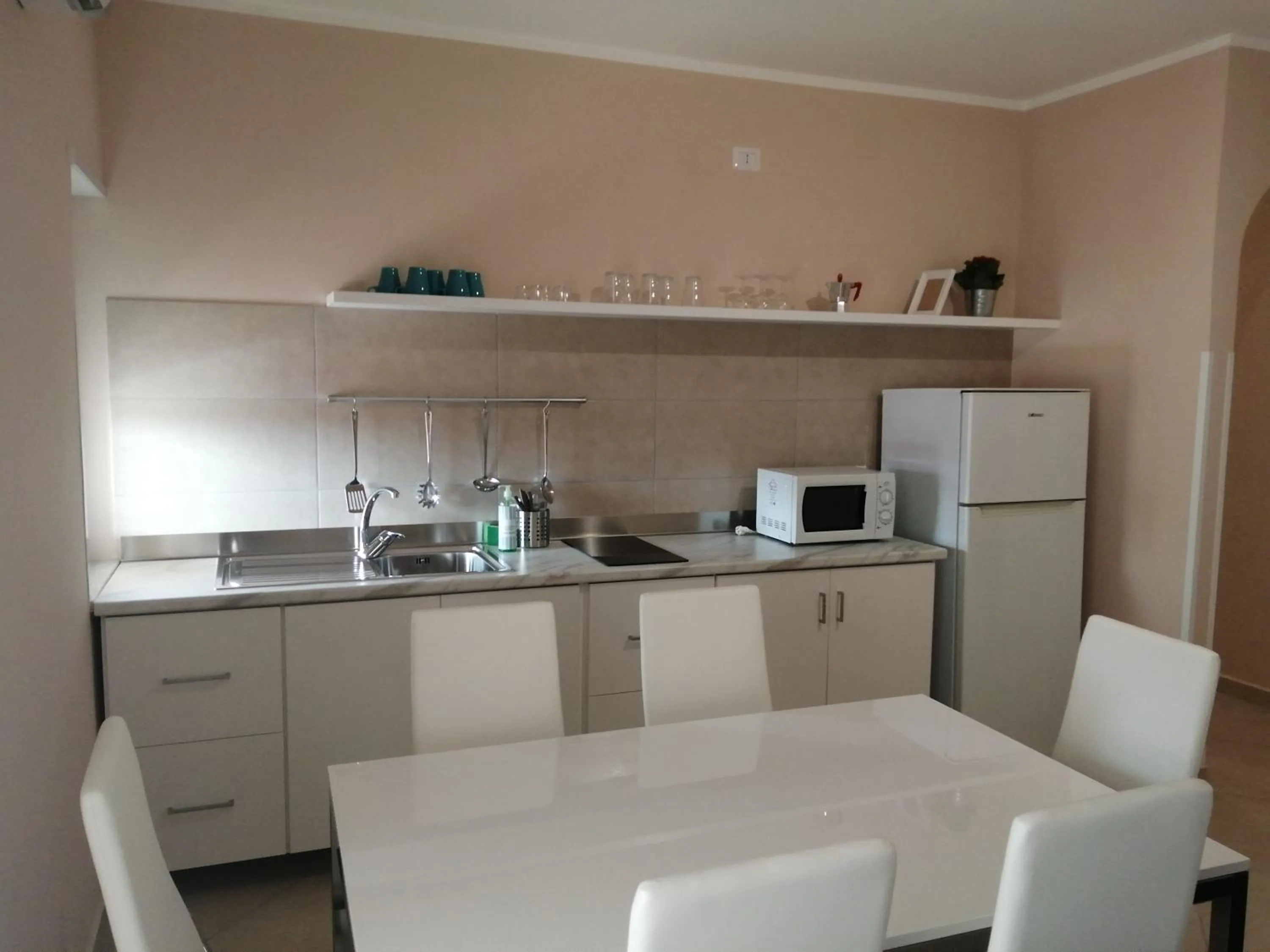 Kitchen or kitchenette in Villa Laura Residence Hotel Apartments & Studios