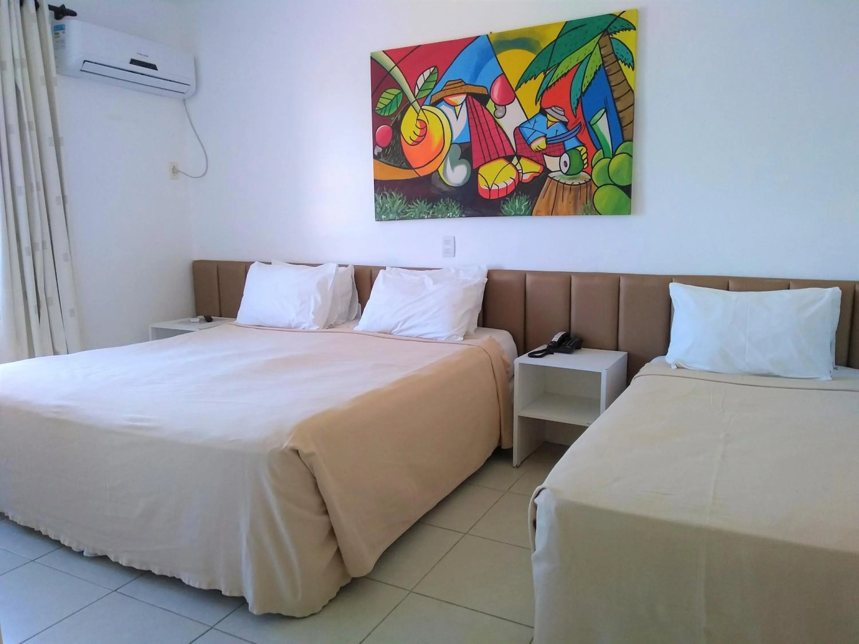 Photo of the whole room, Bed in Simas Praia Hotel