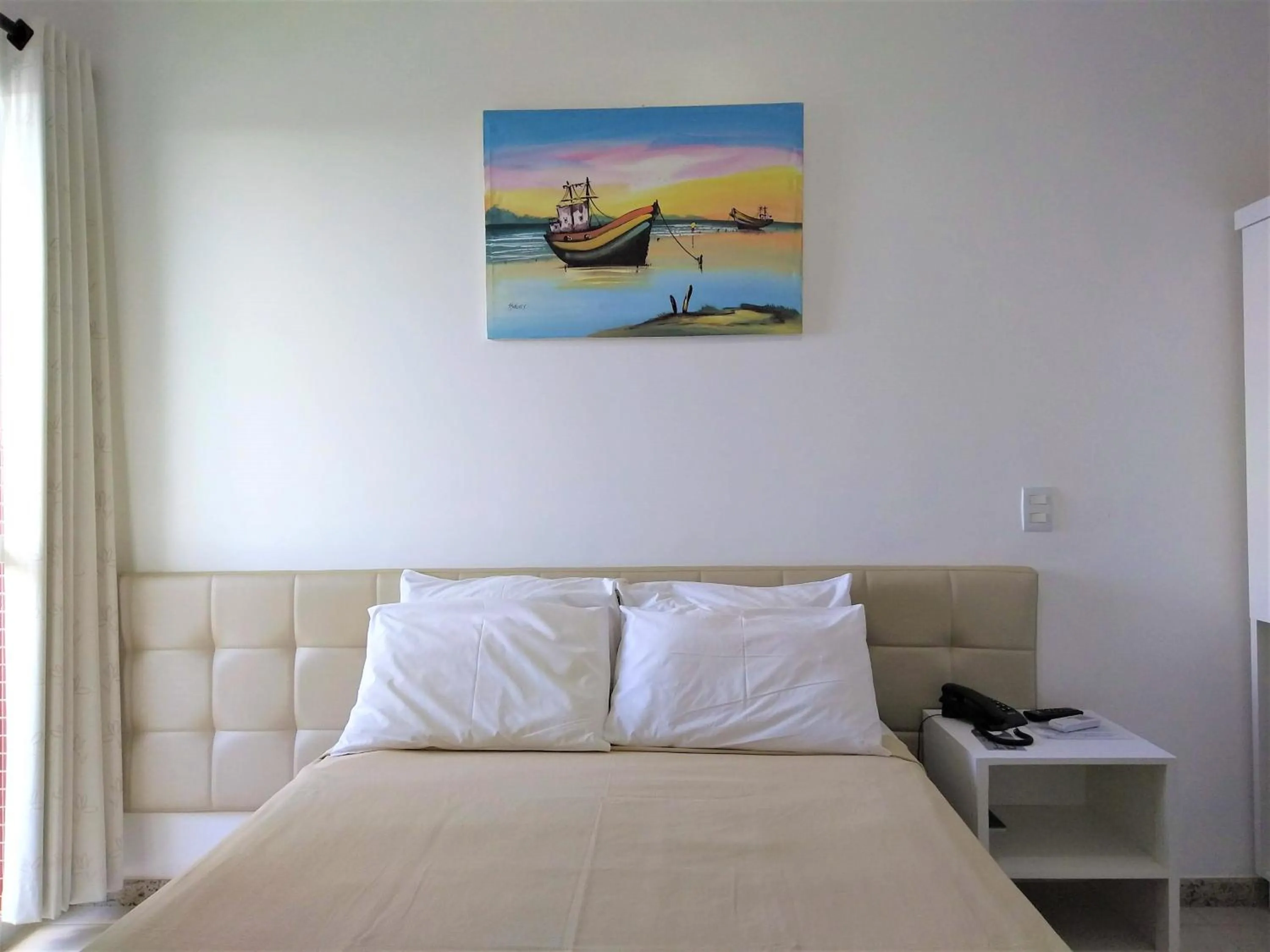 Photo of the whole room, Bed in Simas Praia Hotel