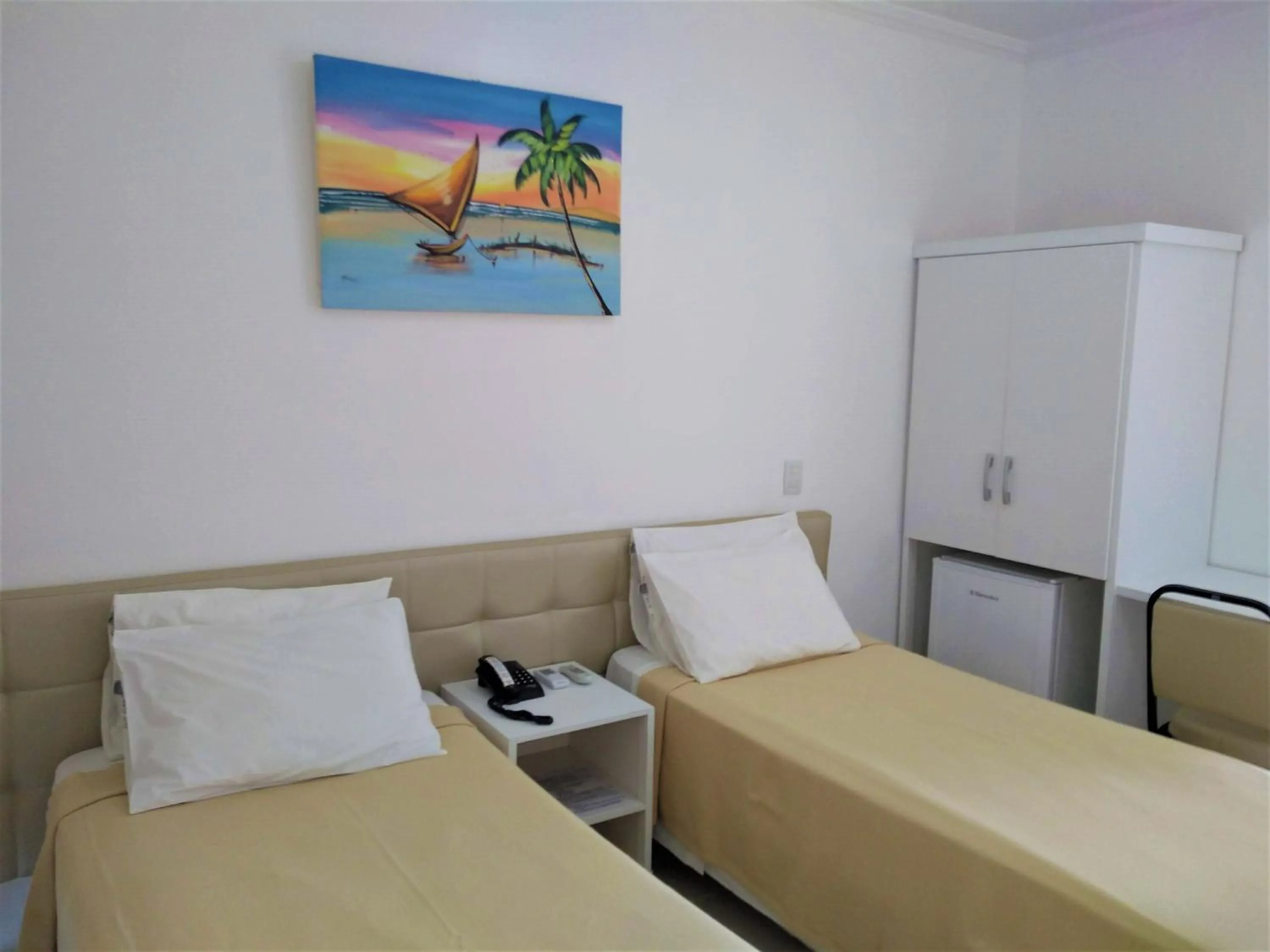 Photo of the whole room, Bed in Simas Praia Hotel