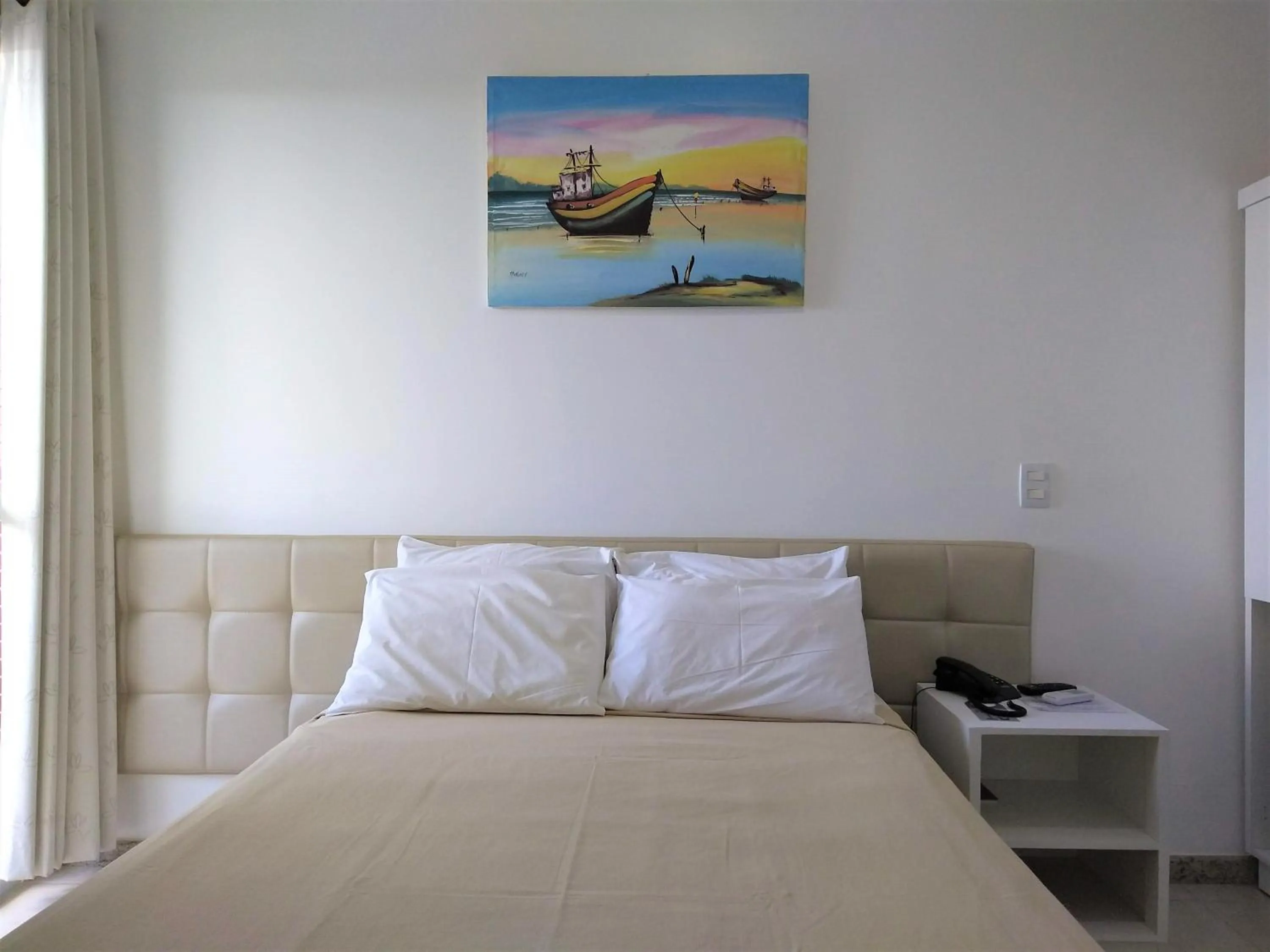 Photo of the whole room, Bed in Simas Praia Hotel