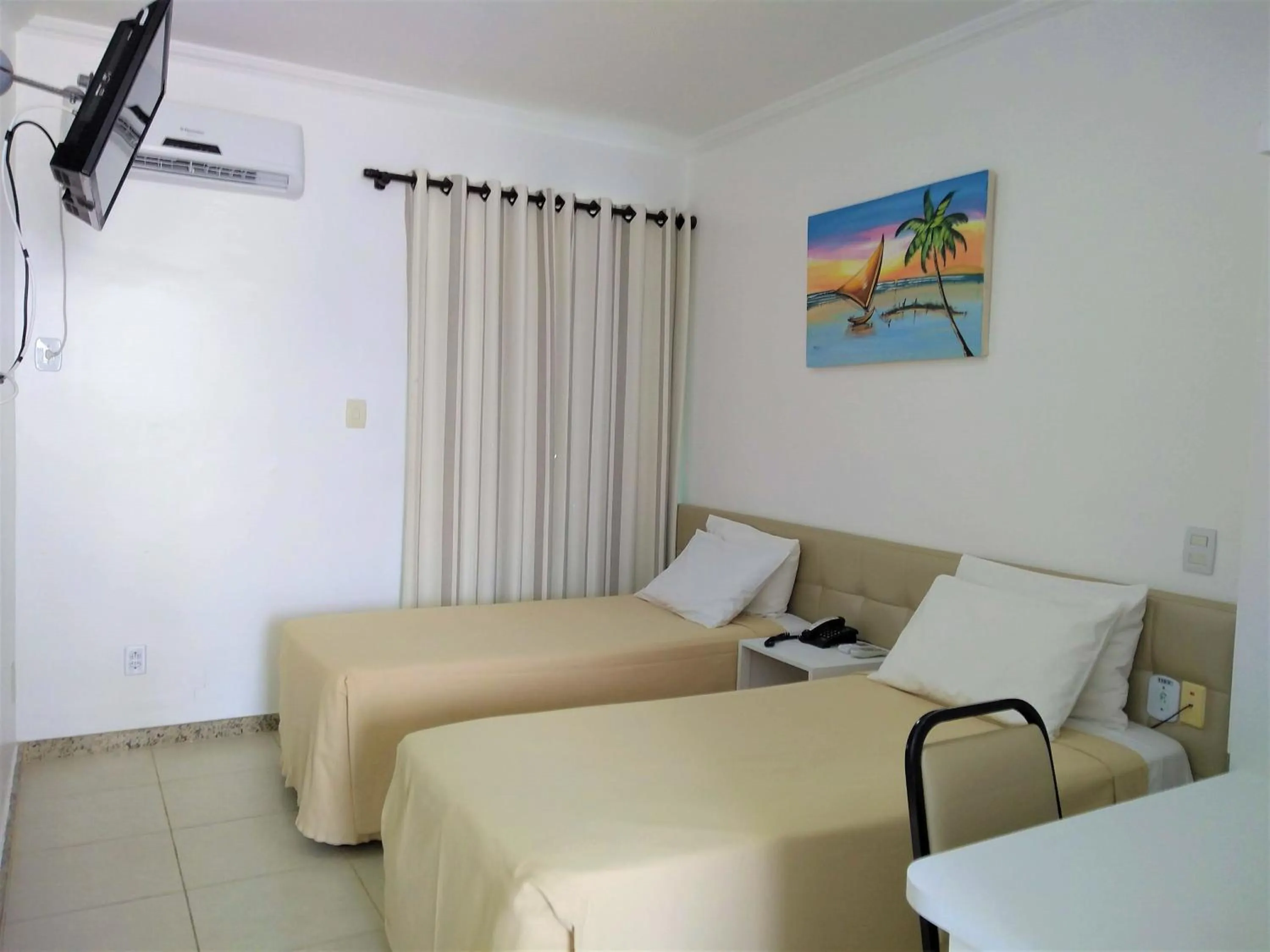 Photo of the whole room, Bed in Simas Praia Hotel