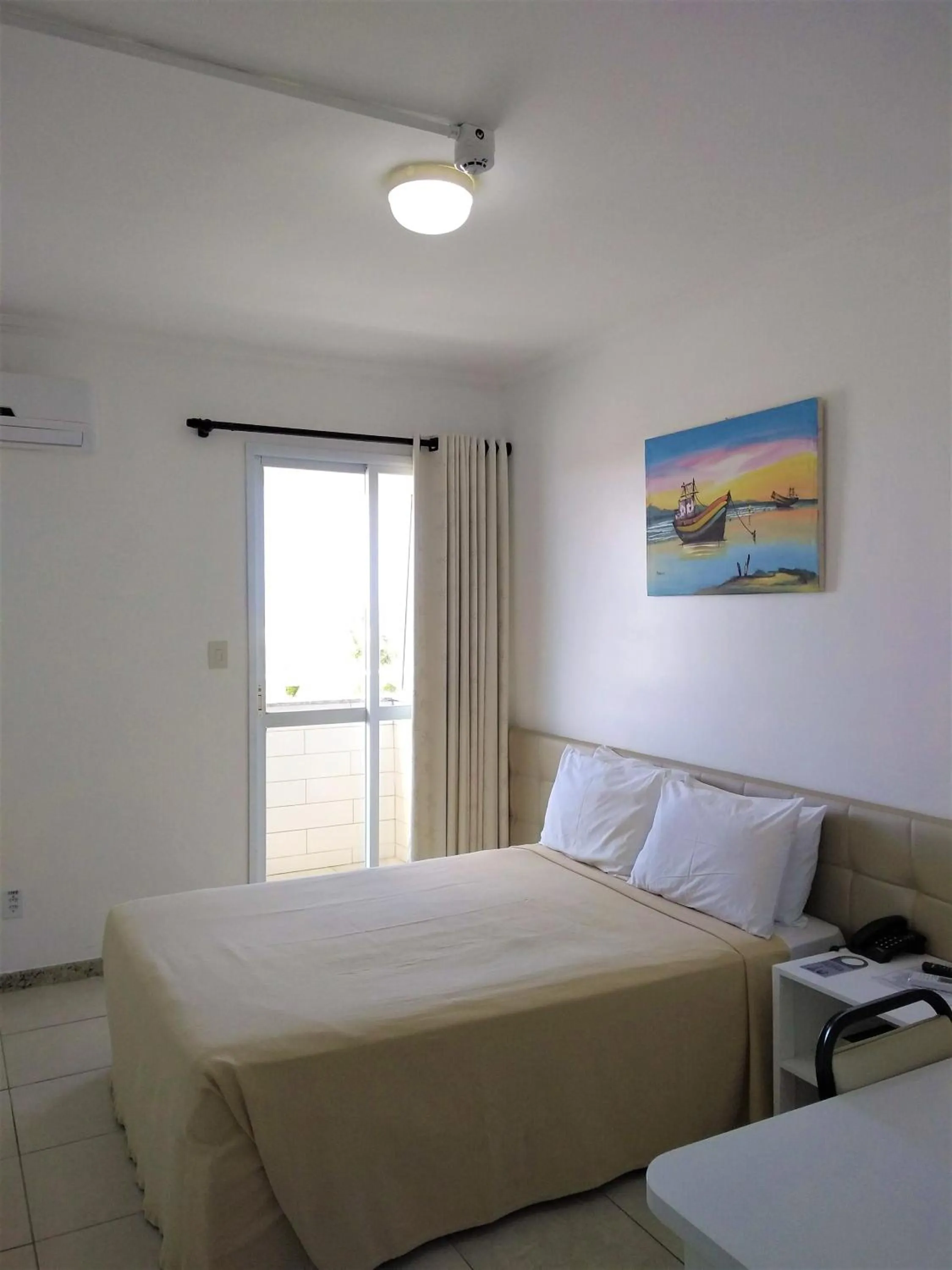 Photo of the whole room, Bed in Simas Praia Hotel