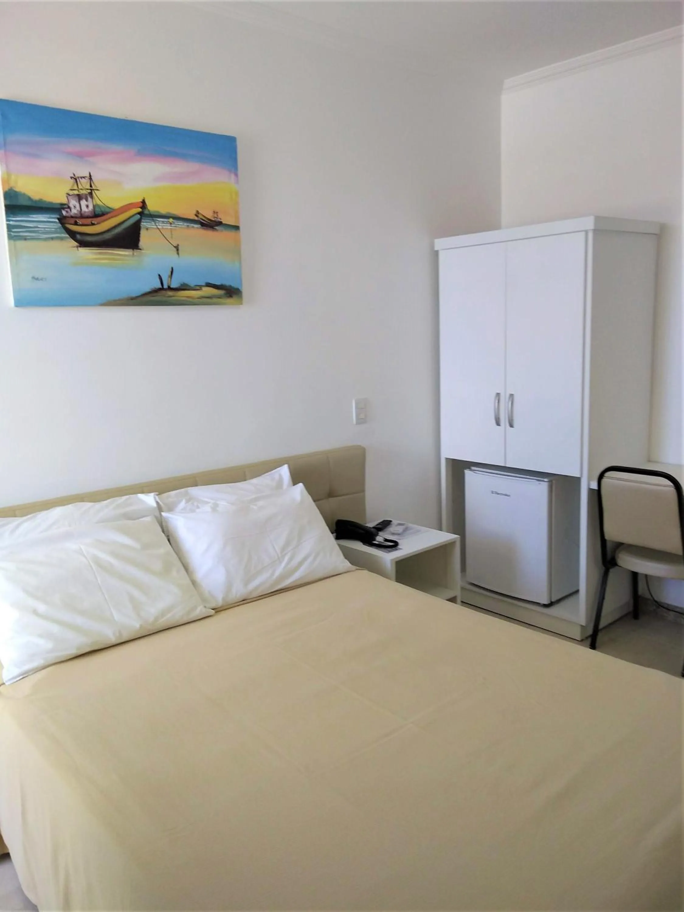 Photo of the whole room, Bed in Simas Praia Hotel