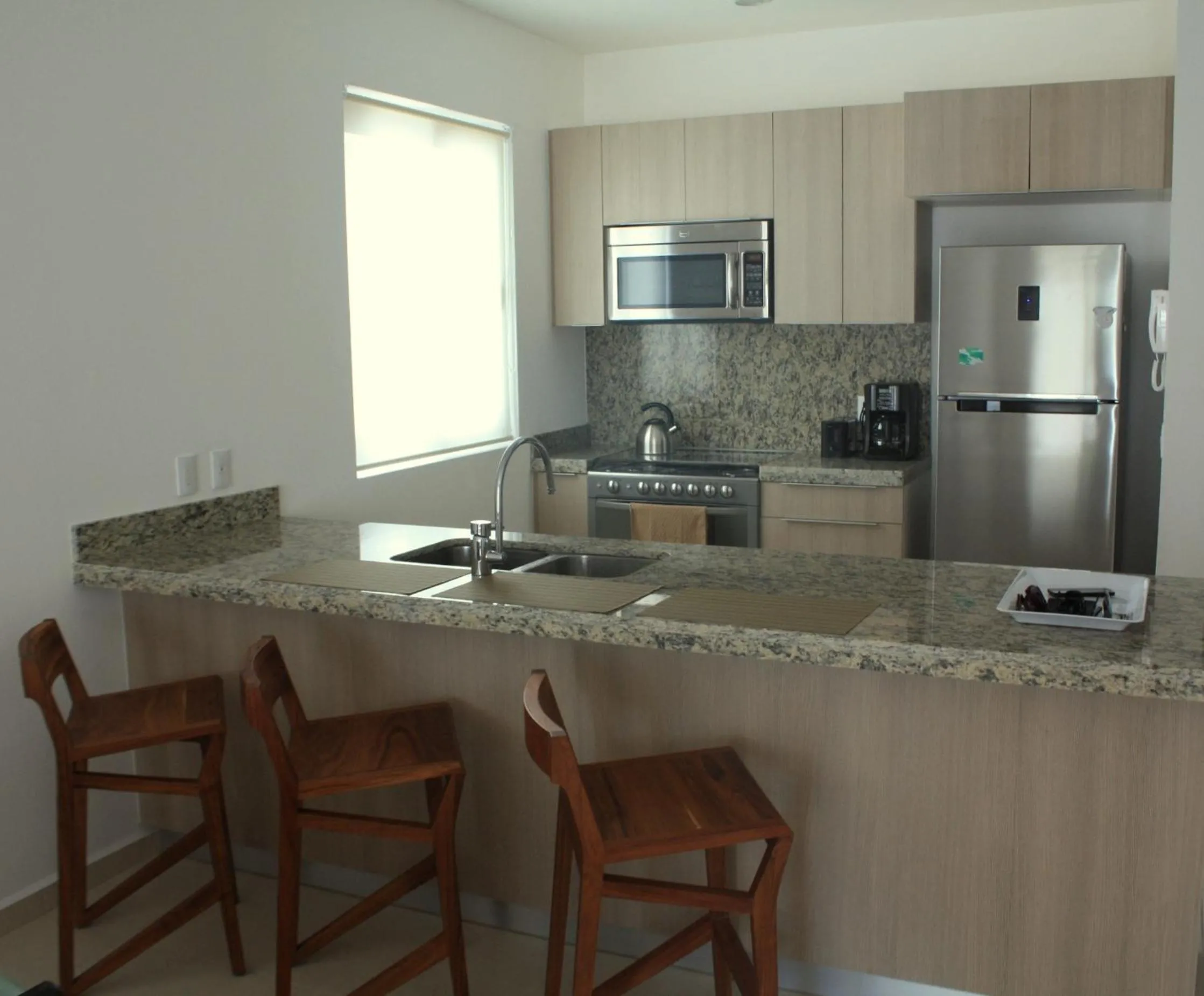 Kitchen or kitchenette in Luxury 2 Bedroom Bahia Principe Condo