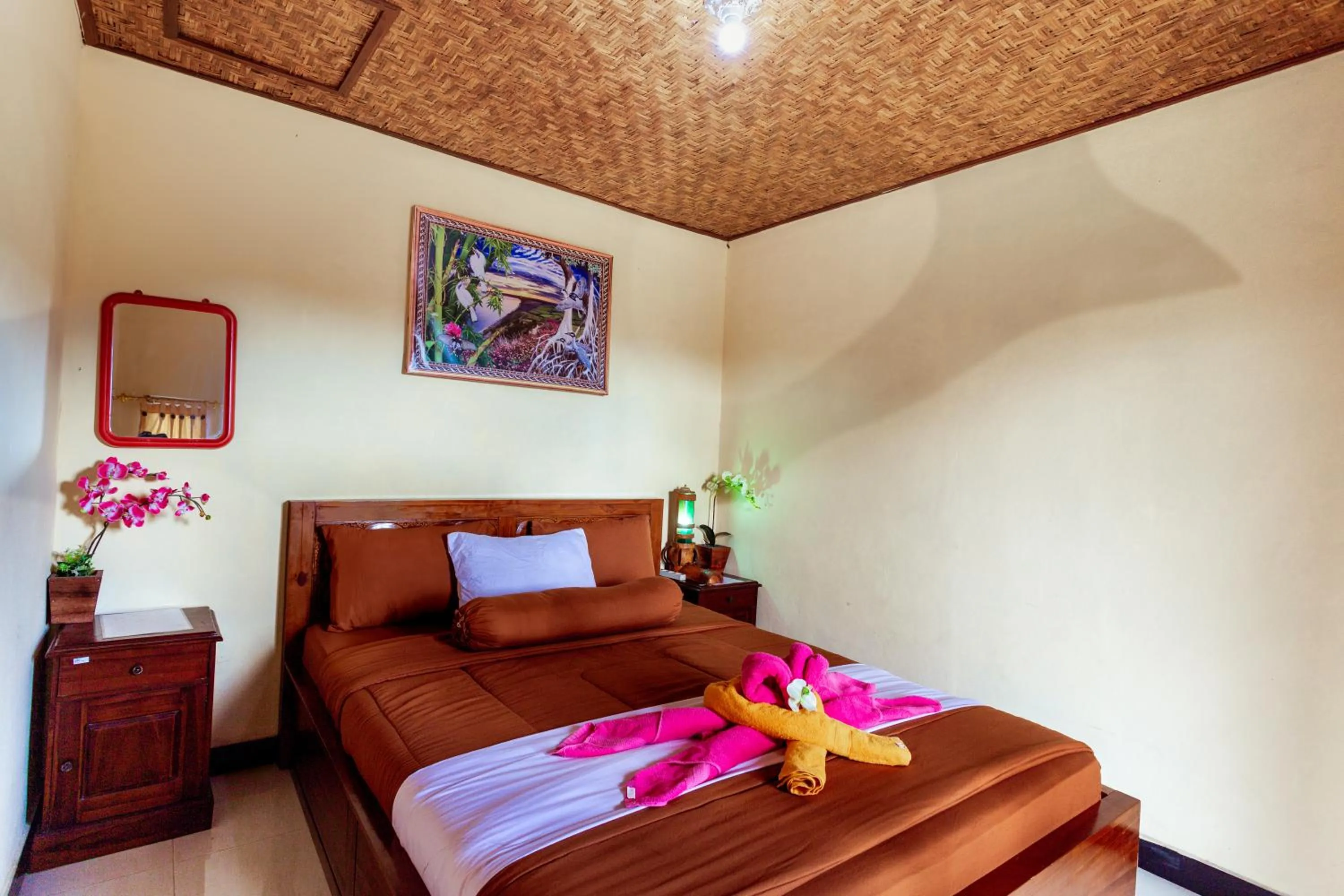 Bed in Batur Bamboo Cabin by ecommerceloka