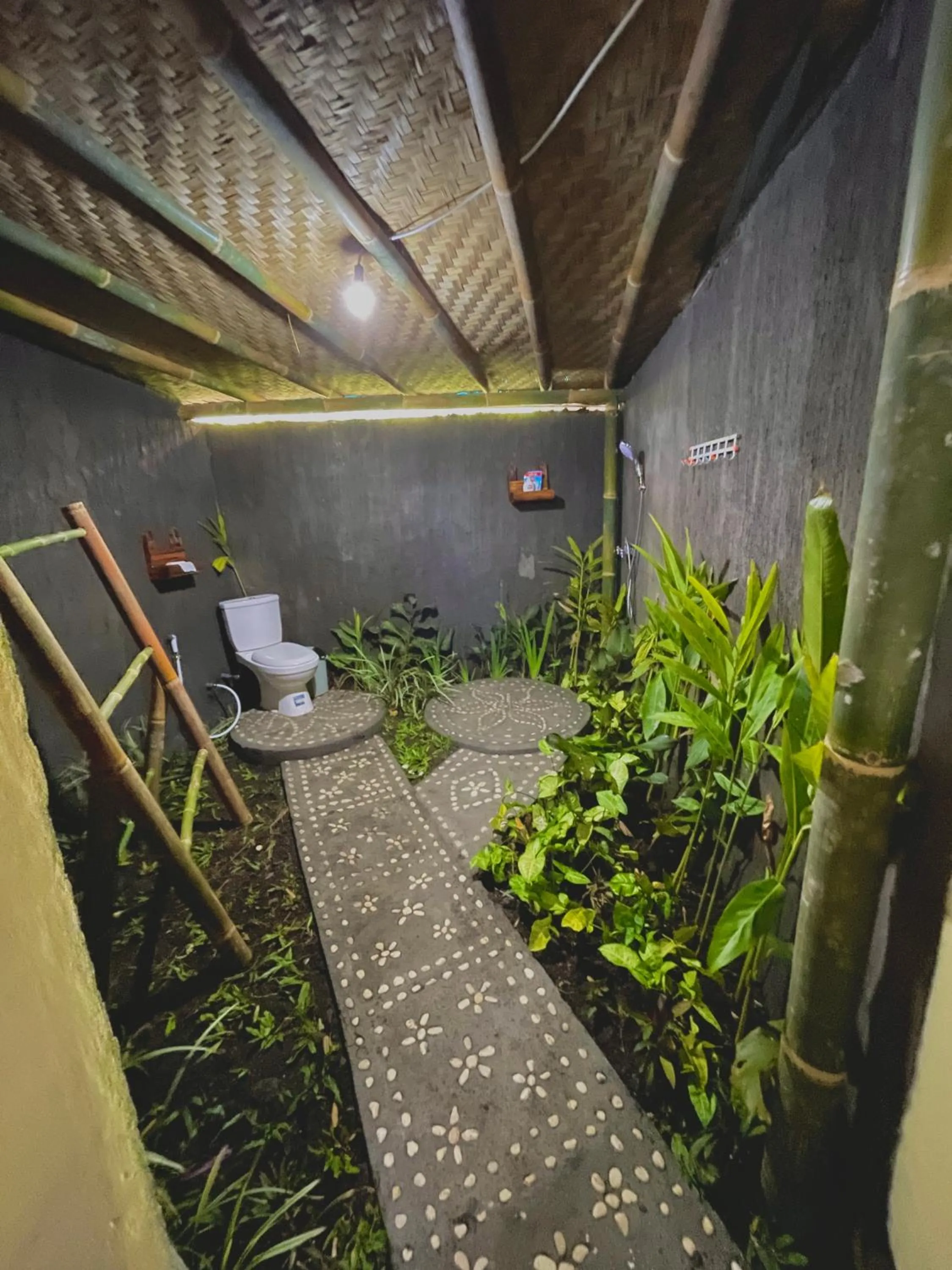 Bathroom in Batur Bamboo Cabin by ecommerceloka