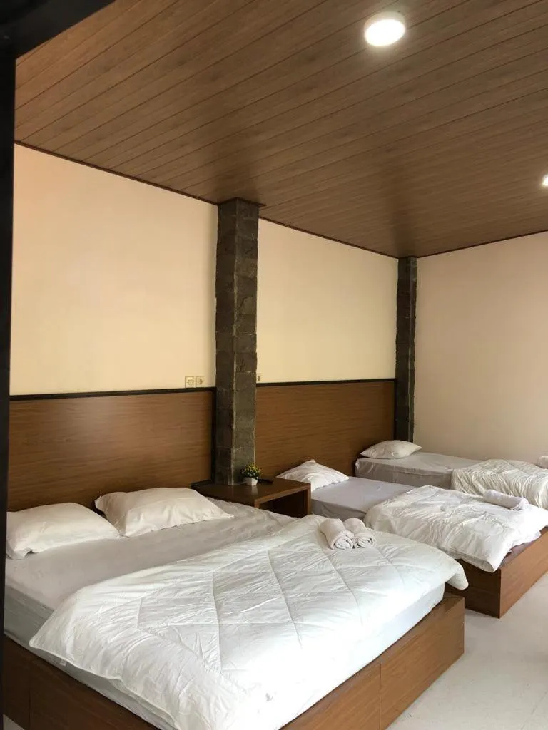 Bed in Bromo Camp House