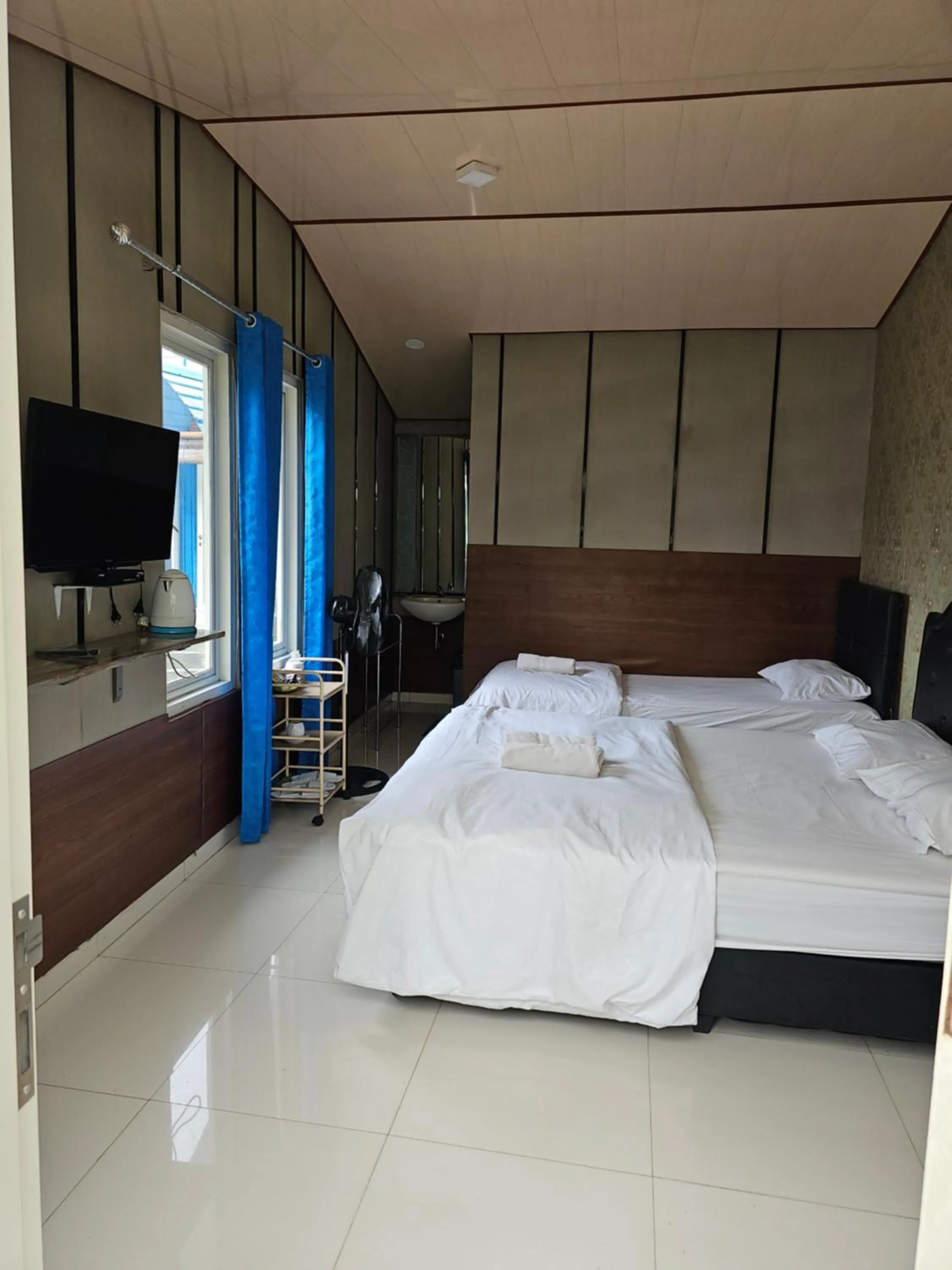 Bed in Bromo Camp House