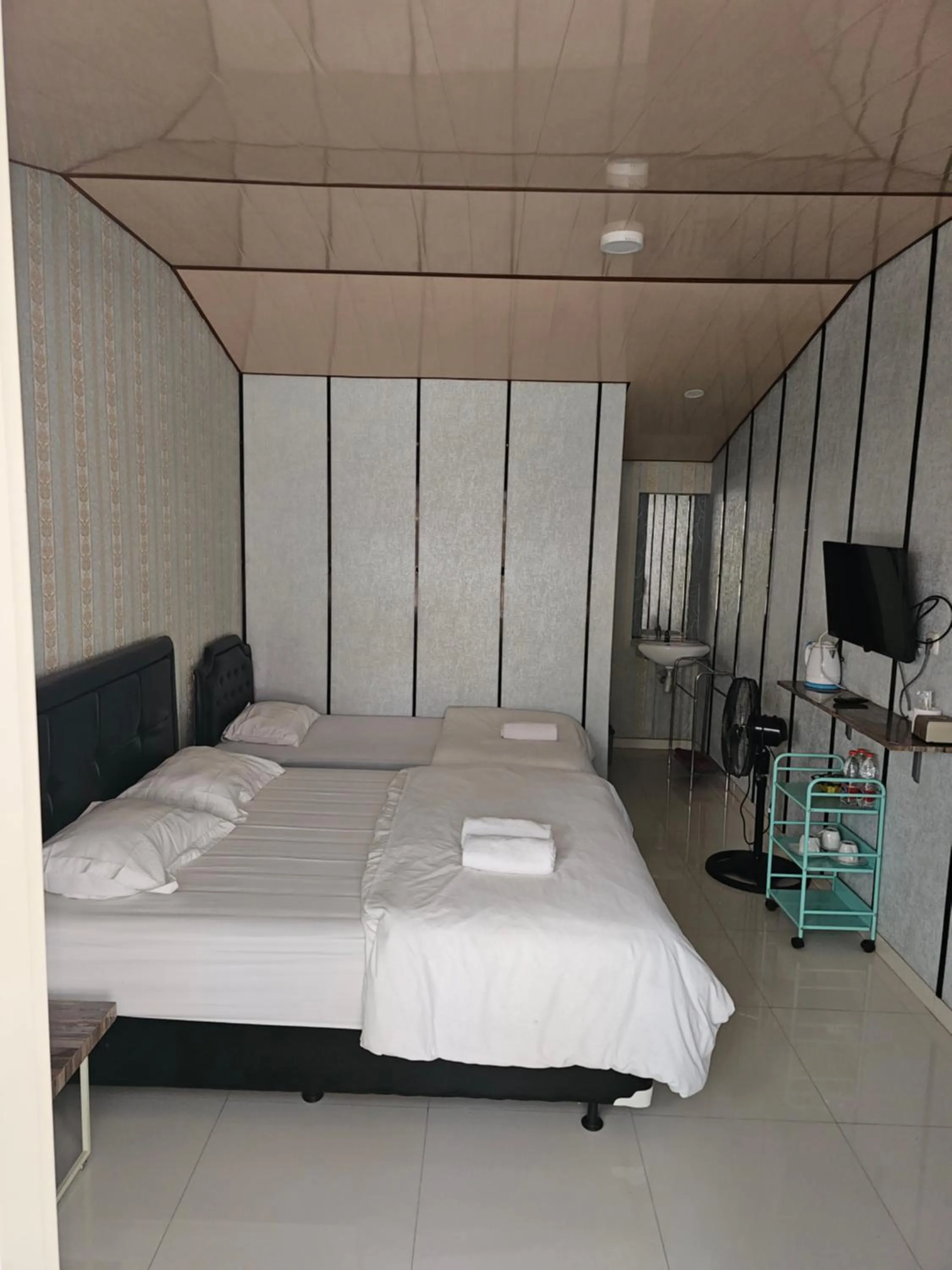 Bed in Bromo Camp House