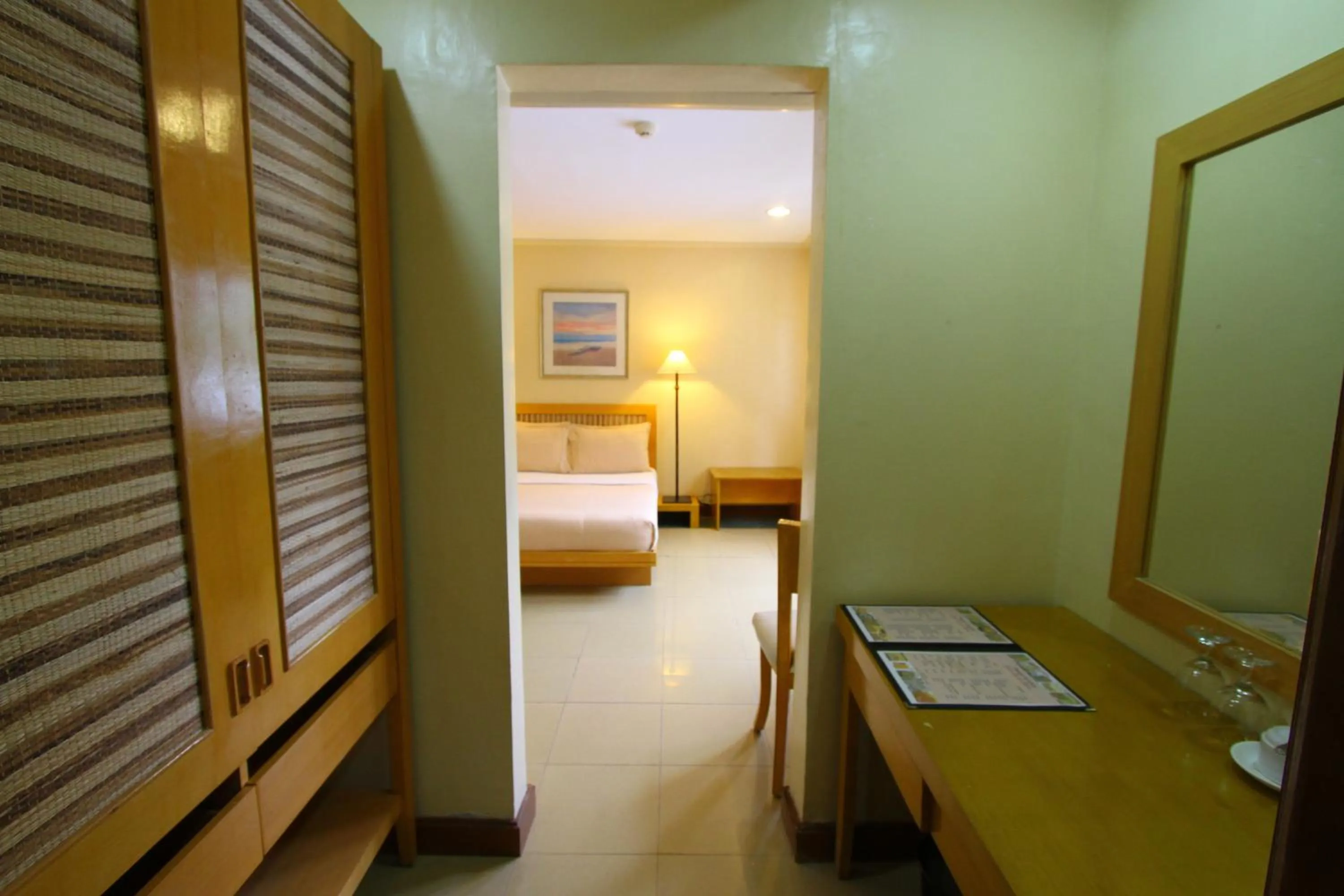 Bed in Trace Suites by SMS Hospitality