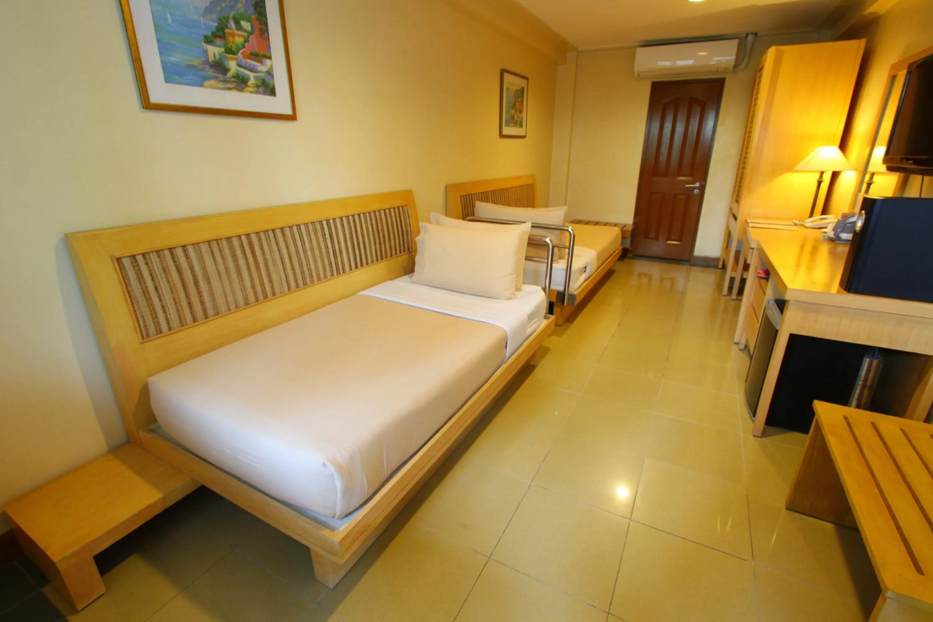 Bed in Trace Suites by SMS Hospitality