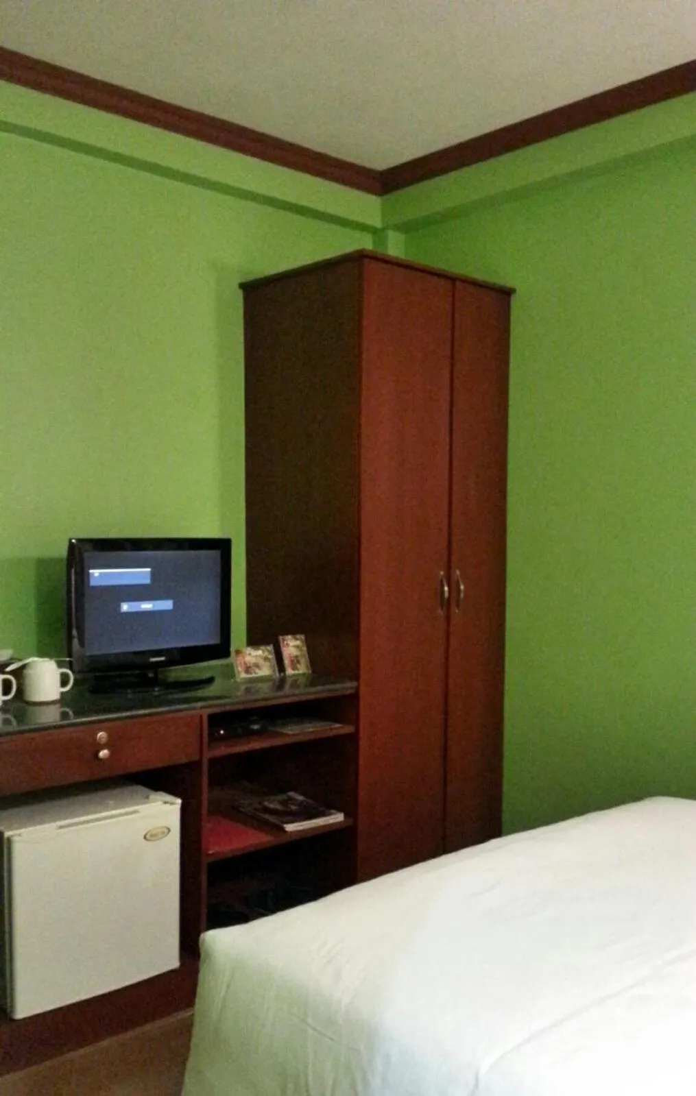 TV and multimedia, Bed in TINHAT Halal حلال Certified Boutique Hotel And Restaurant