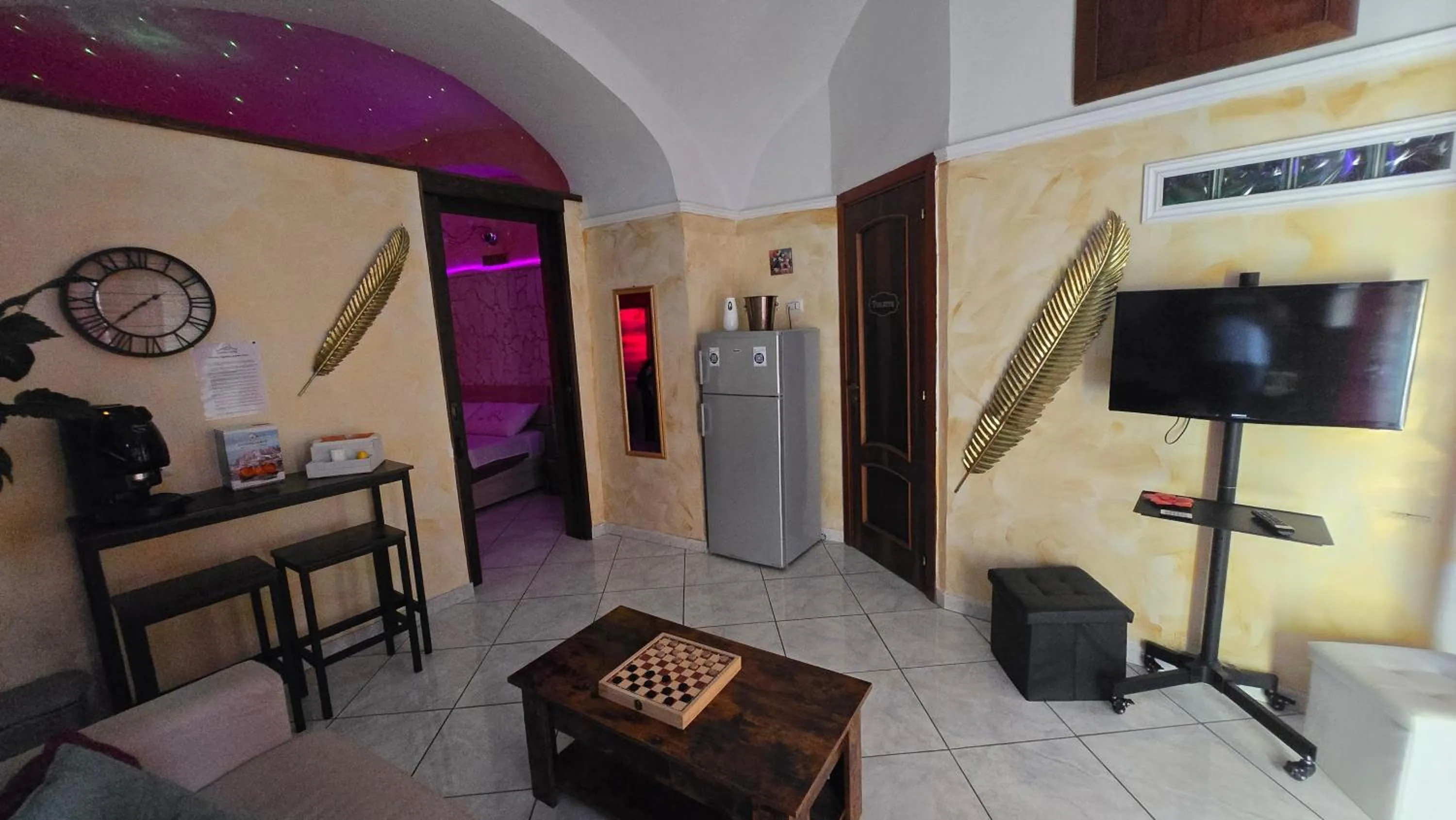 Communal lounge/ TV room in pergolesi