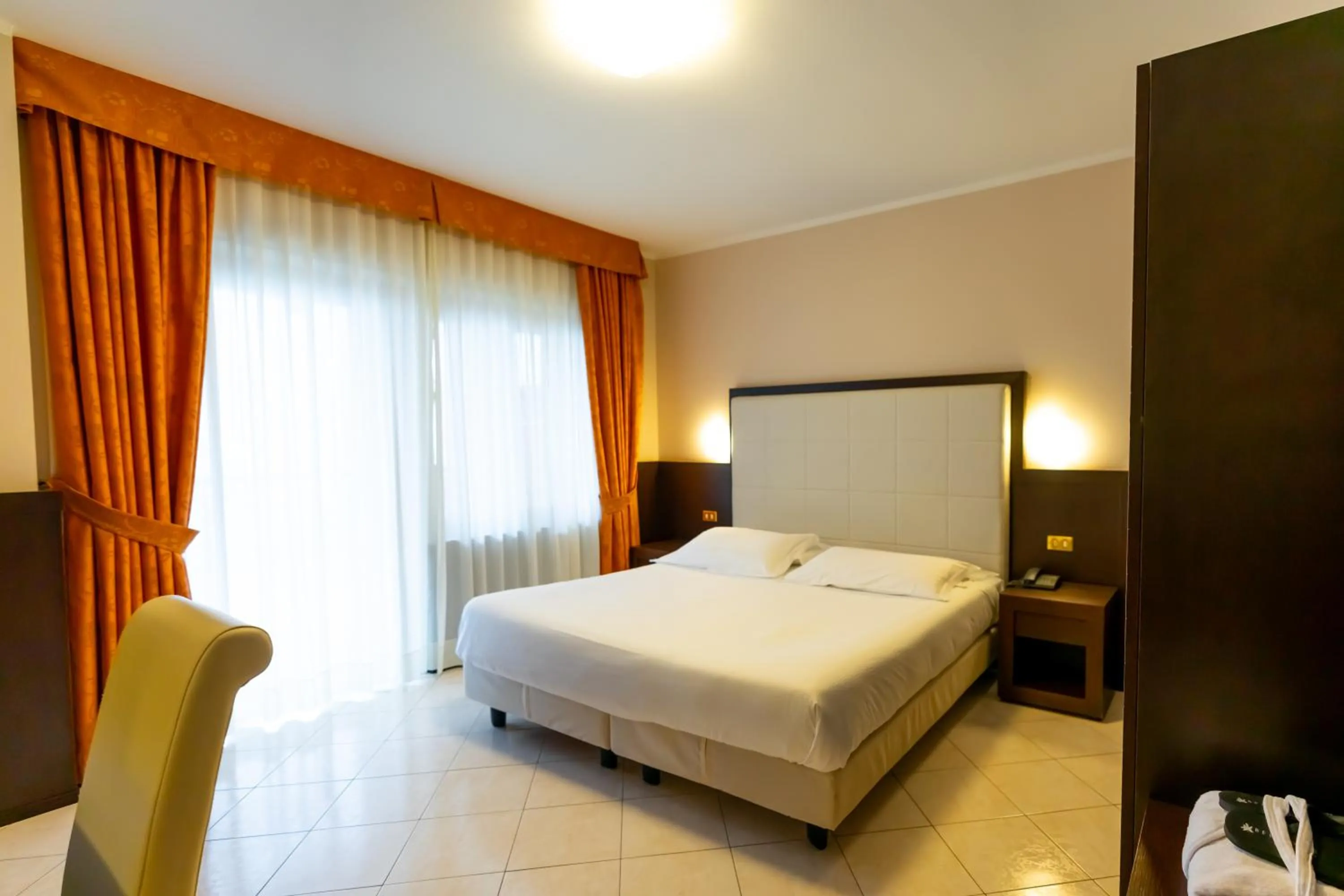 Bed in Hotel Belvedere Wellness&SPA