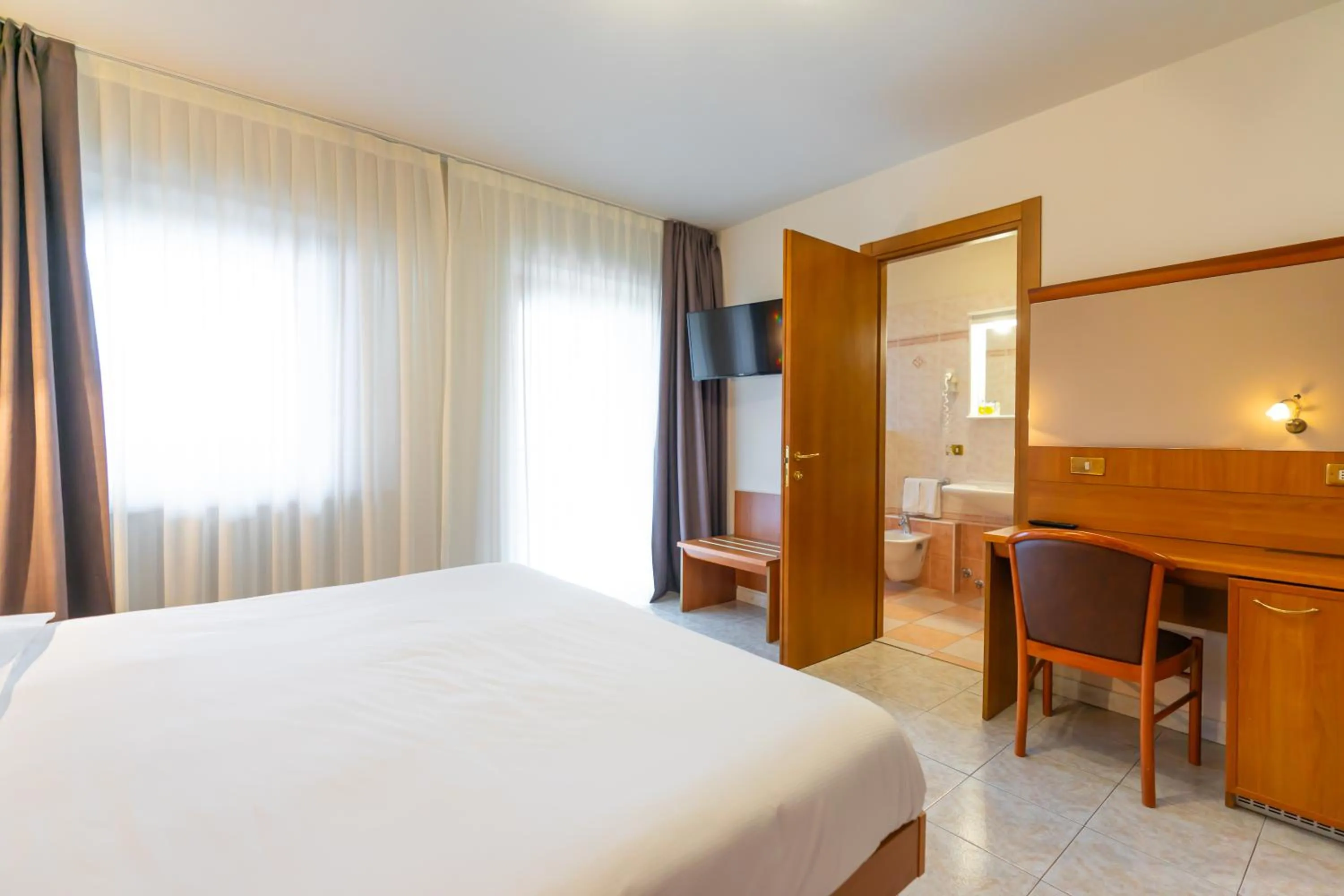 Bed in Hotel Belvedere Wellness&SPA