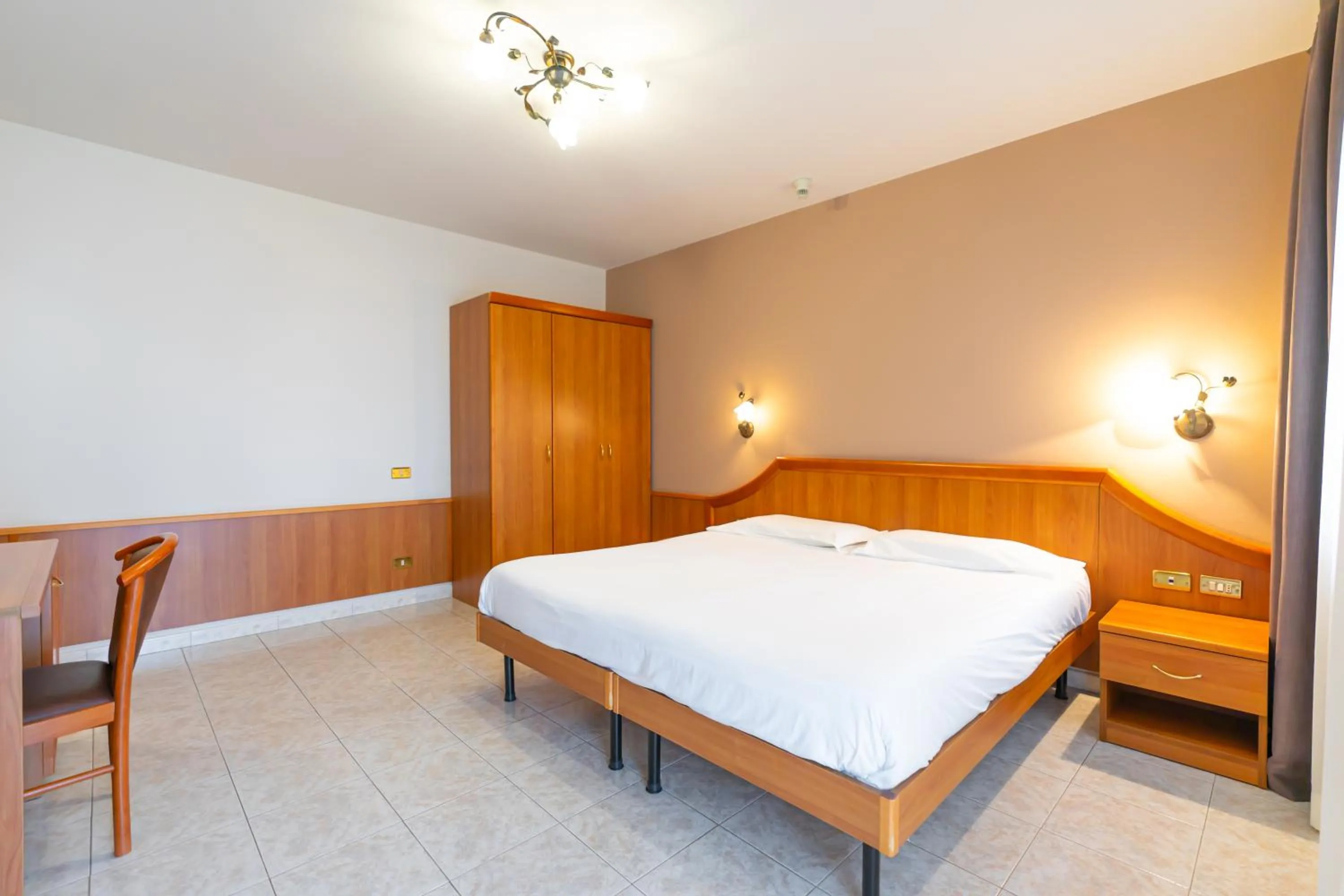 Bed in Hotel Belvedere Wellness&SPA