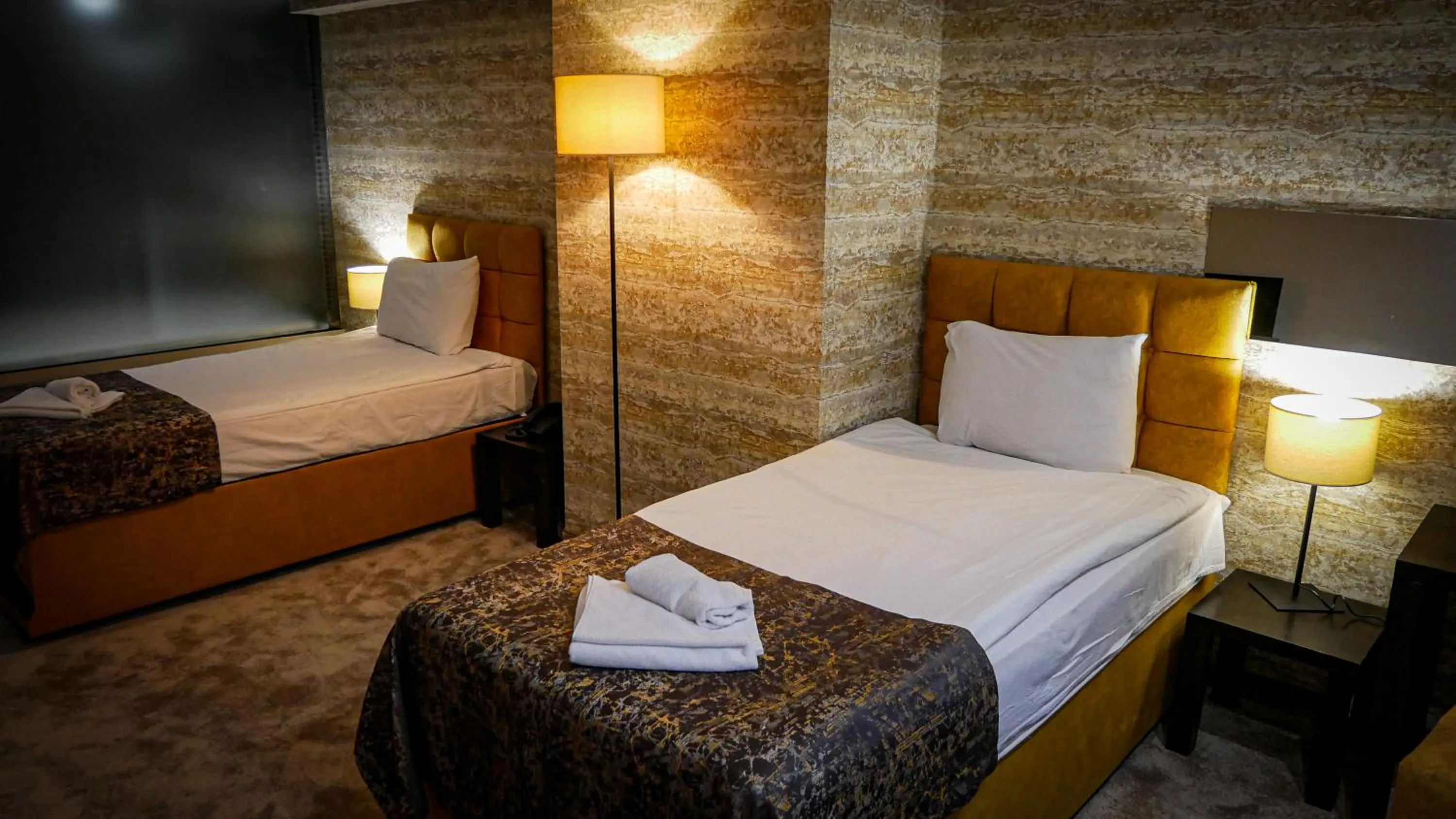 Bed in Riverside Boutique Hotel