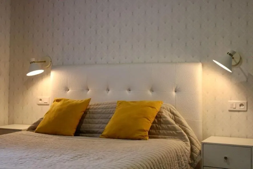 Bed in Logis Hôtel L'Ayguelade