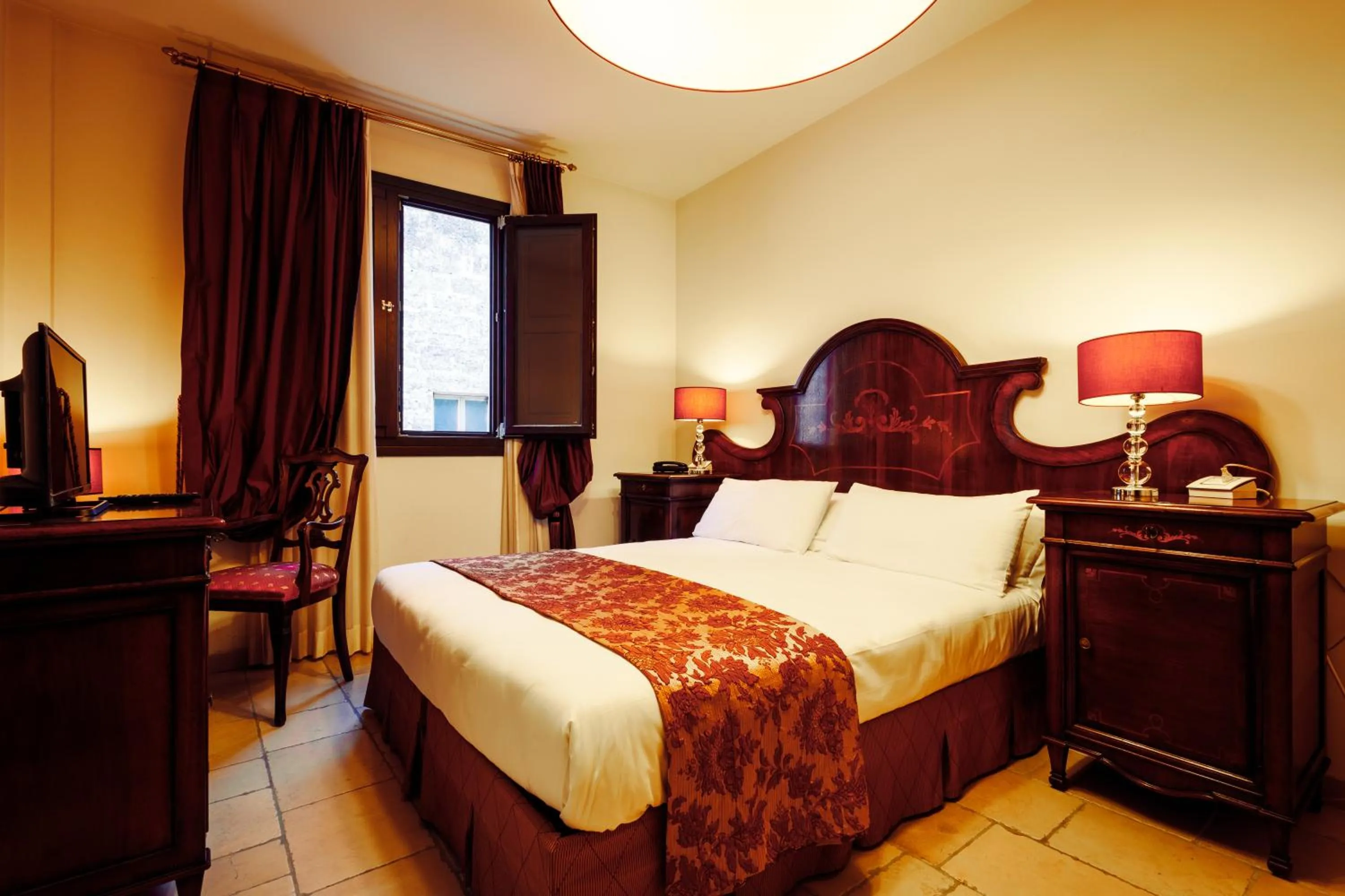 Bed in Vico Regio Hotel