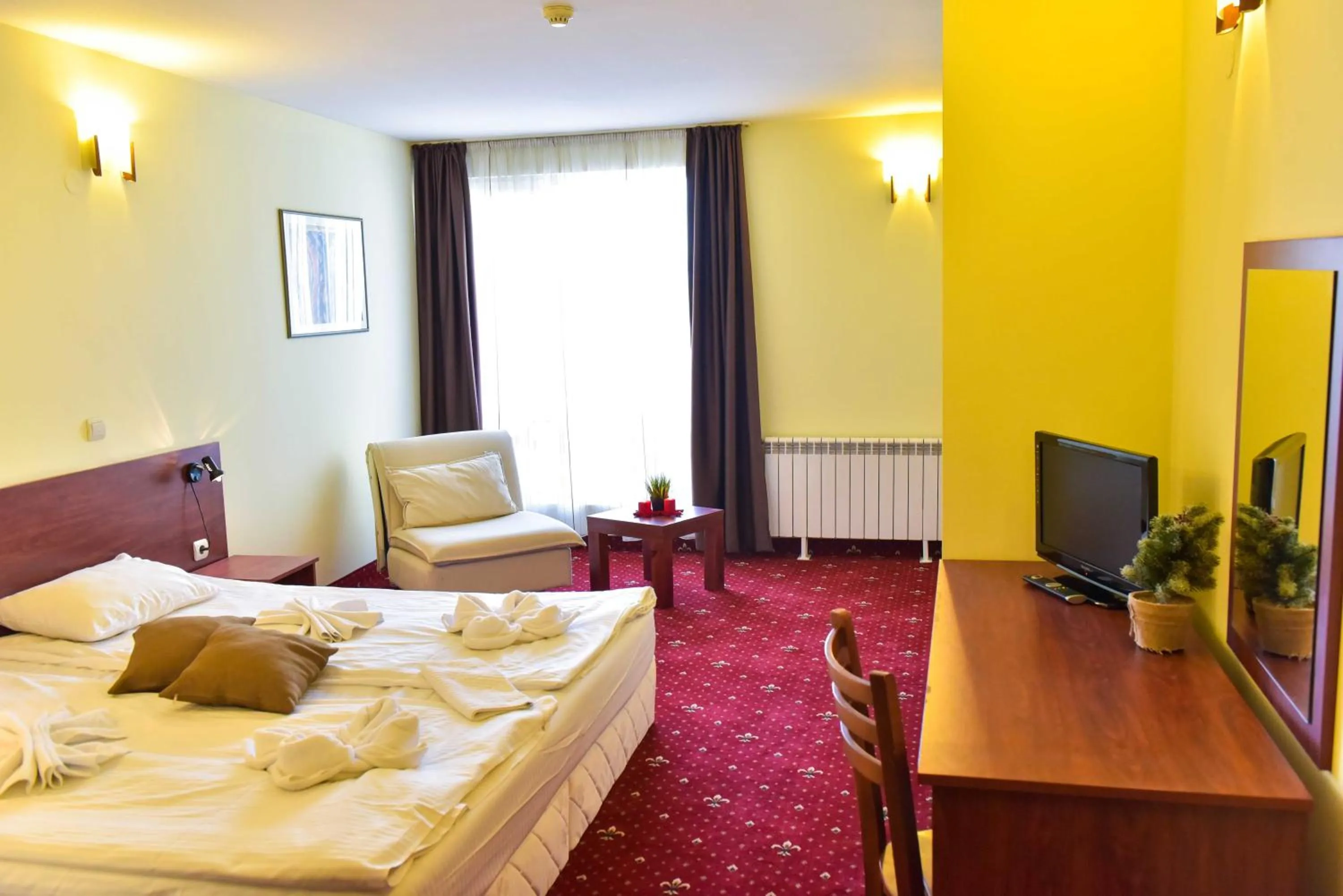 Photo of the whole room, Bed in Hotel Bojur & Bojurland Apartment Complex