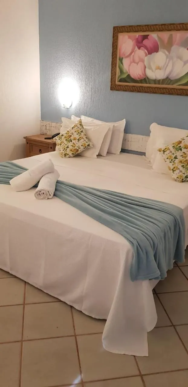 Bed in Coronado Inn Hotel