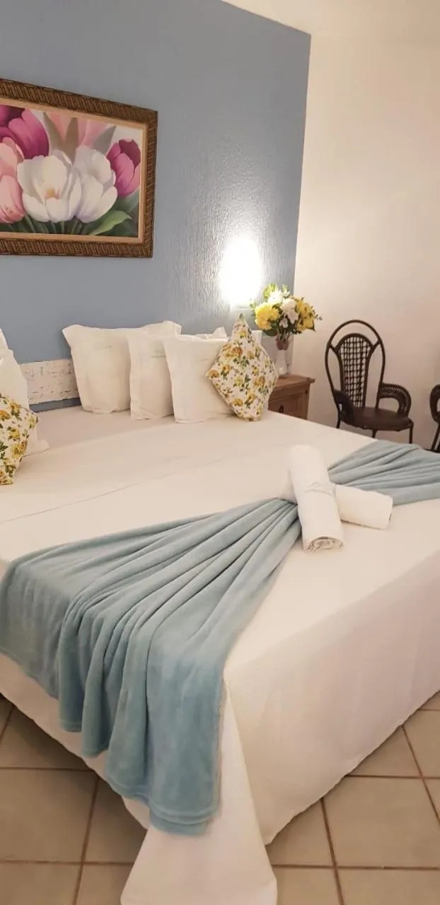 Bed in Coronado Inn Hotel