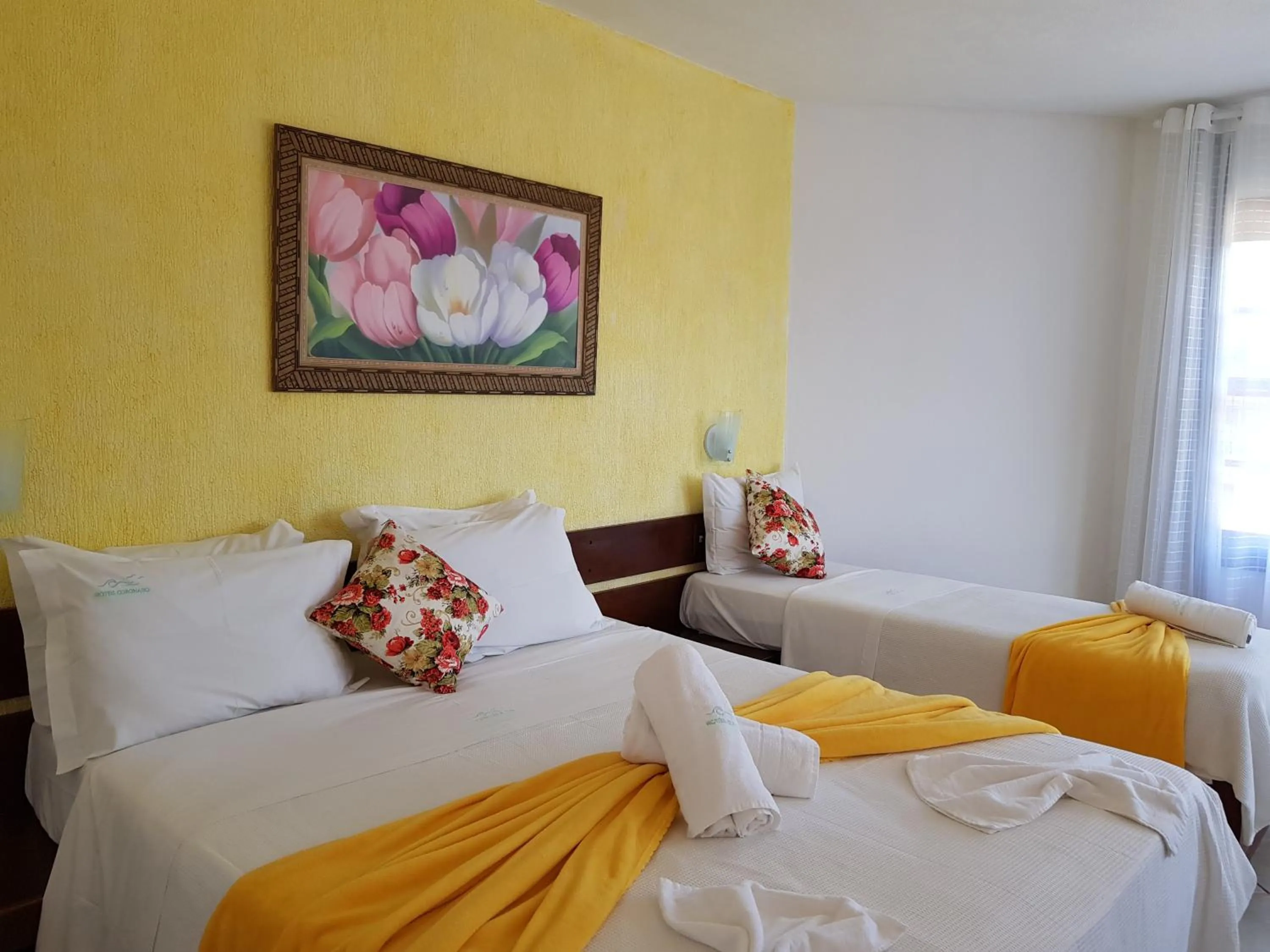 Bed in Coronado Inn Hotel