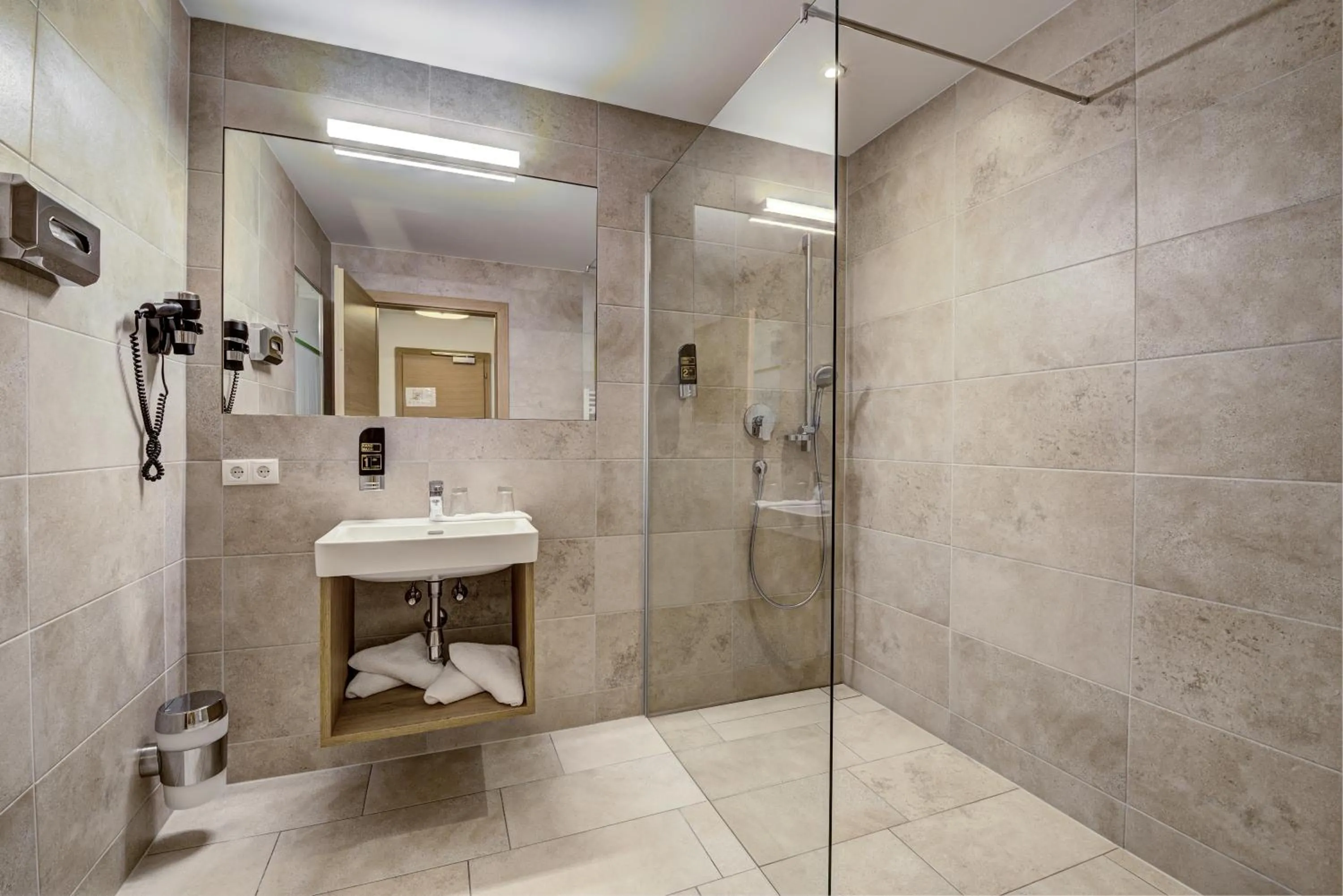 Shower in KOSIS Sports Lifestyle Hotel