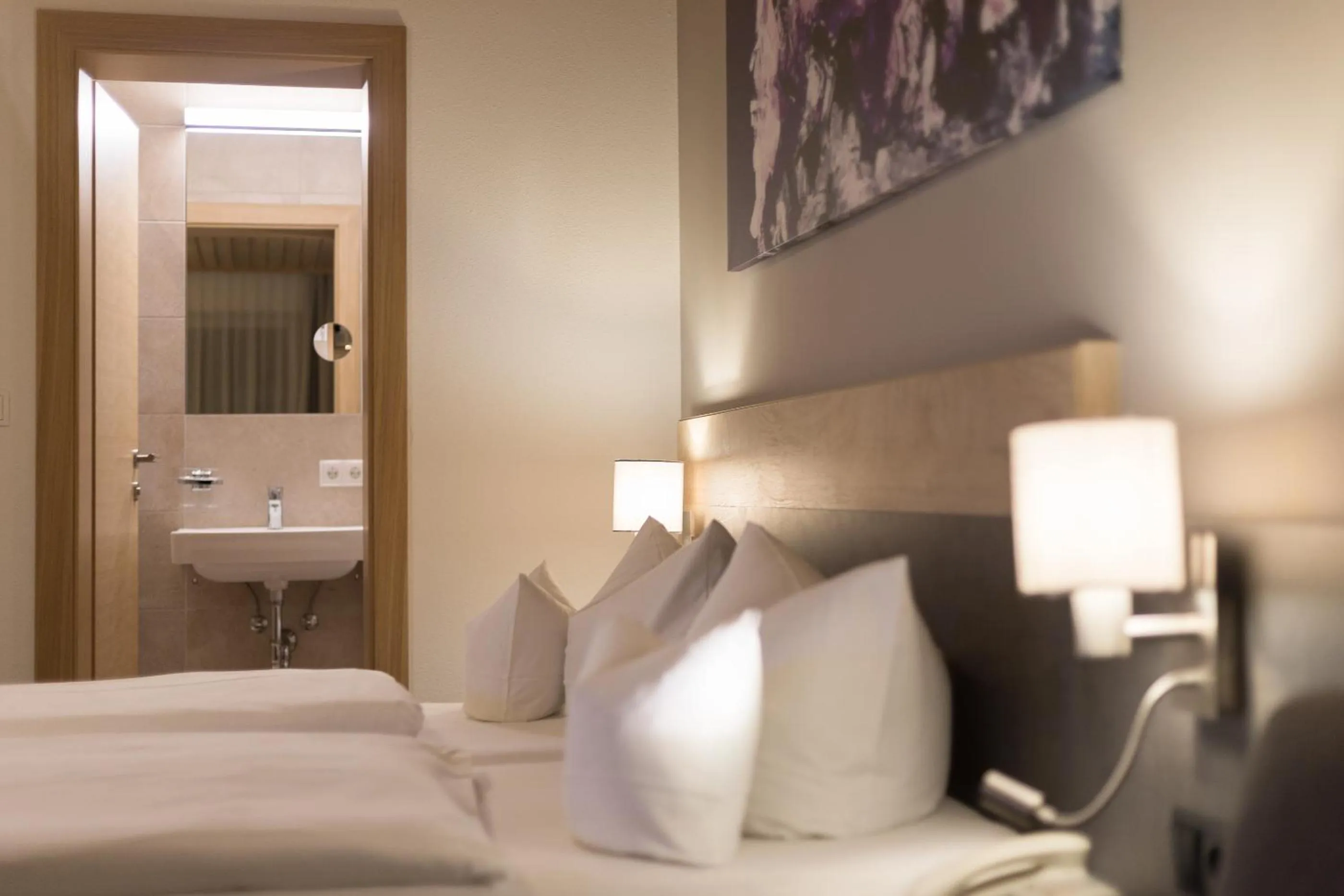 Bed in KOSIS Sports Lifestyle Hotel