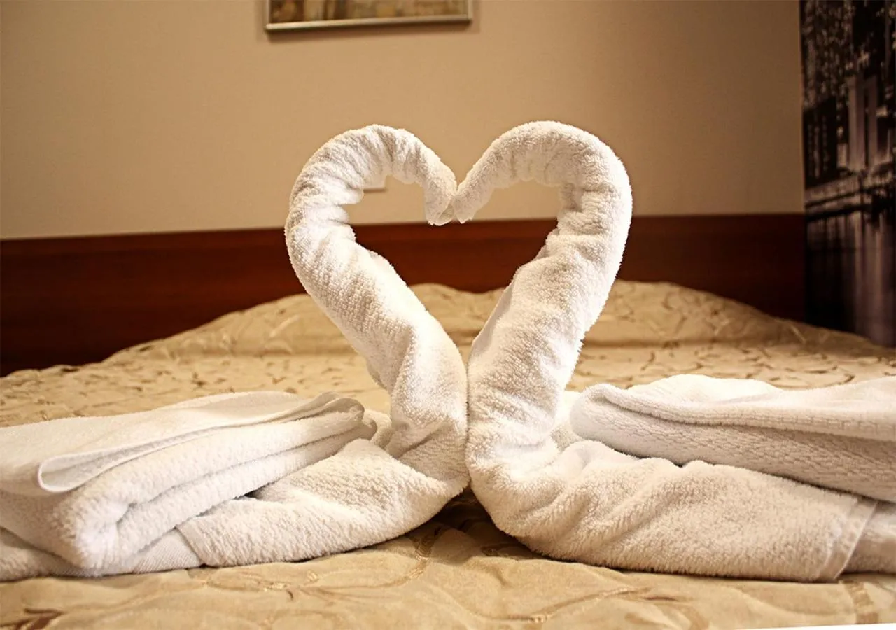 Bed in Hotel Ambasador