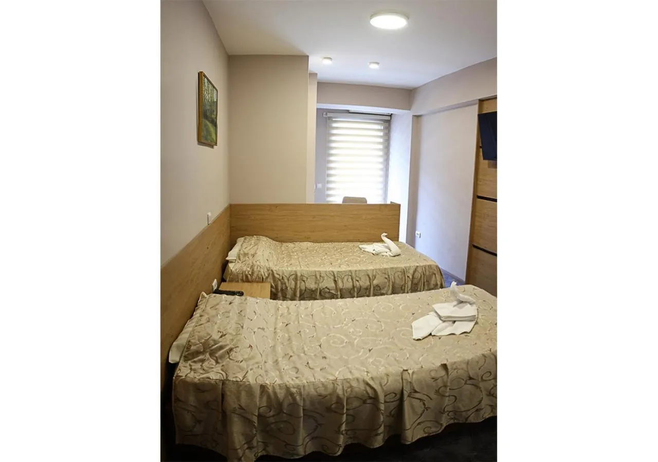 Bed in Hotel Ambasador