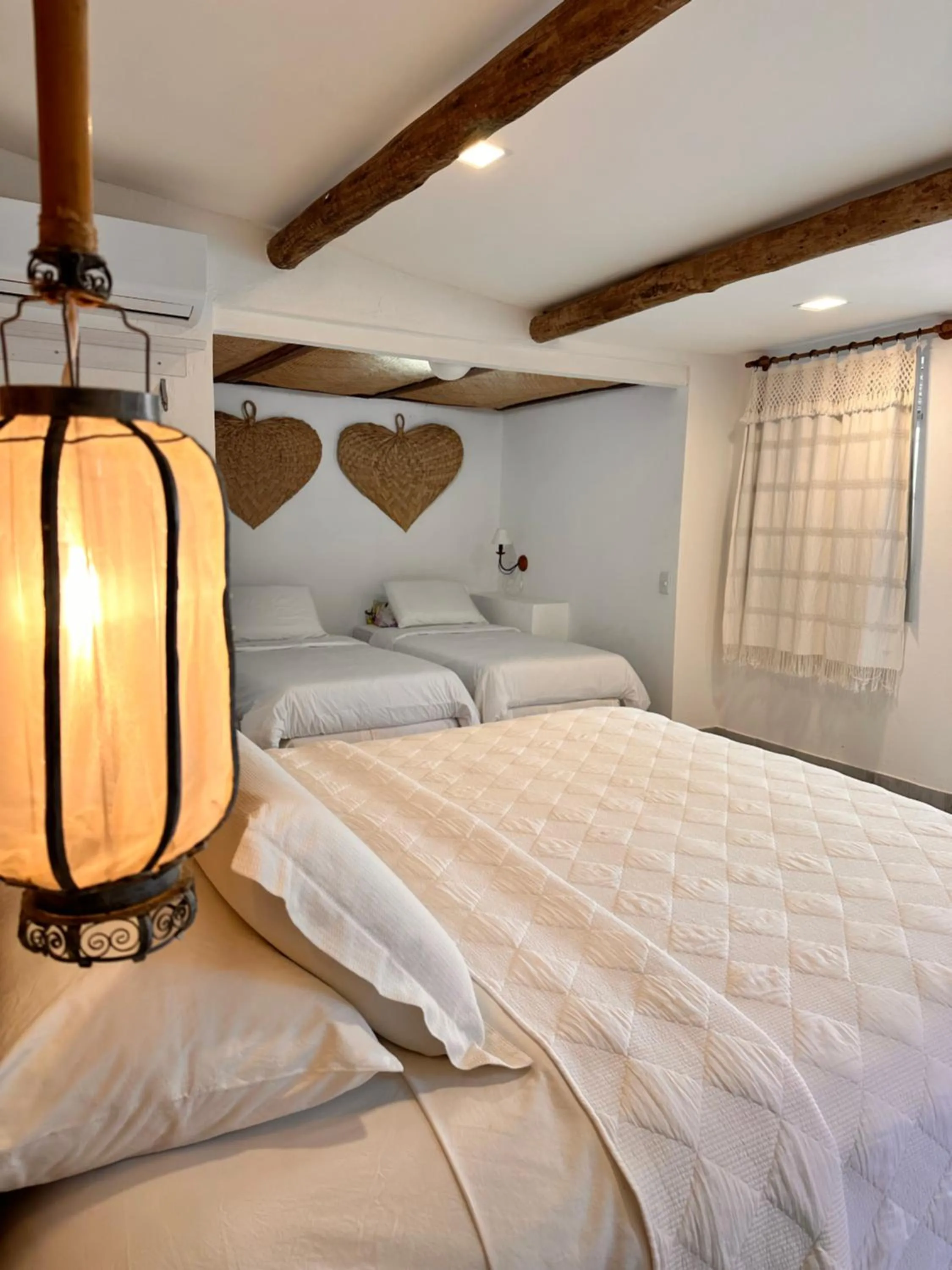 Bed in Pousada Oásis