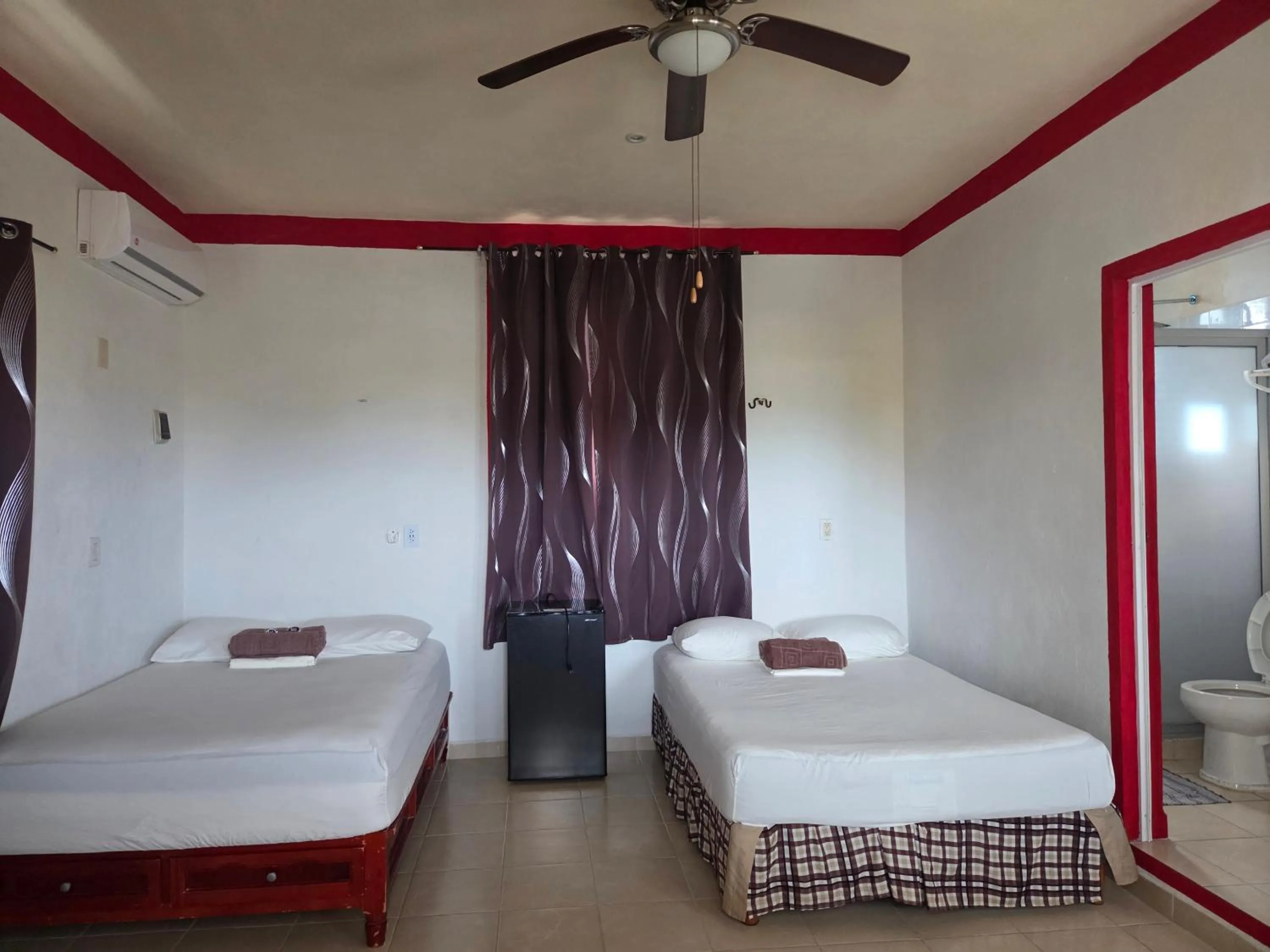 Photo of the whole room, Bed in El Padrino